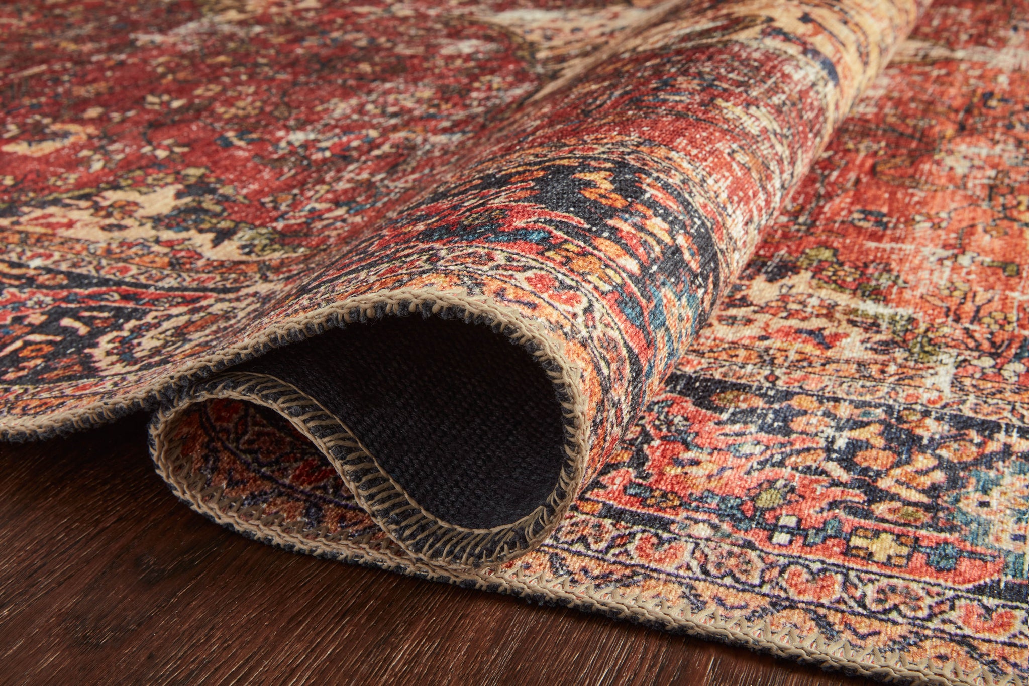 lifestyle view of Loren Red / Navy luxury Rug