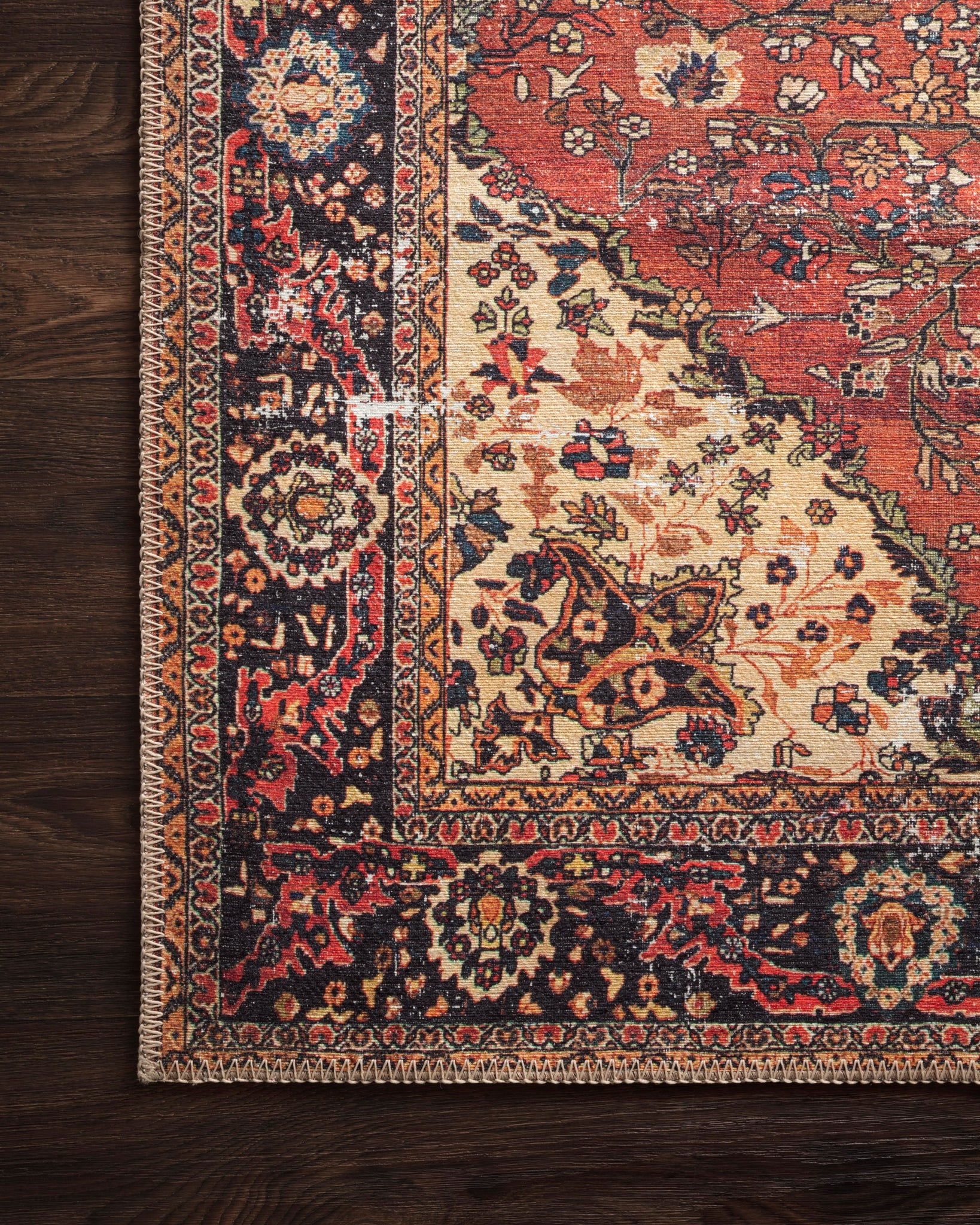 lifestyle view of Loren Red / Navy luxury Rug