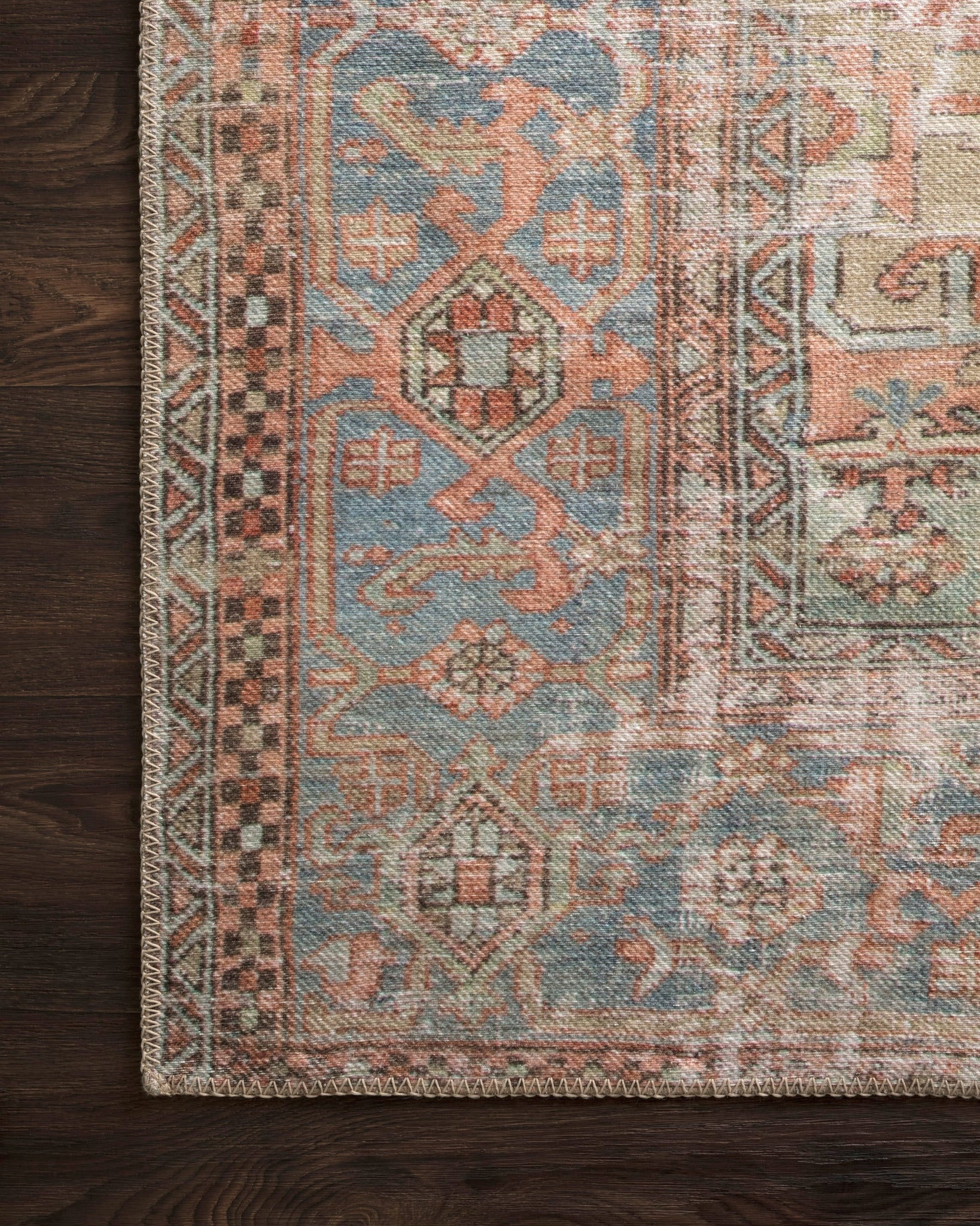 lifestyle view of Loren Terracotta / Sky luxury Rug