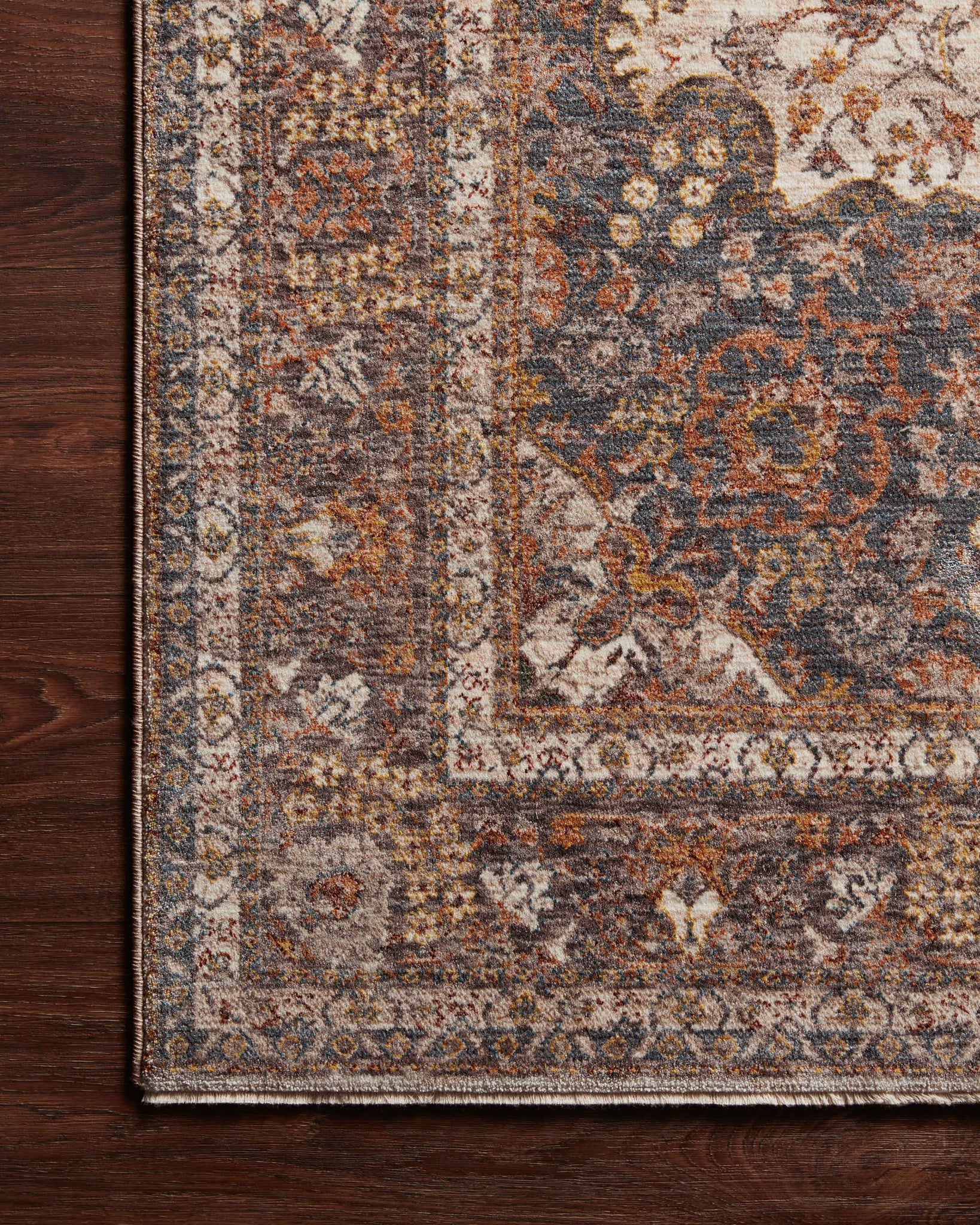 side view of Lourdes Natural / Ocean luxury Rug