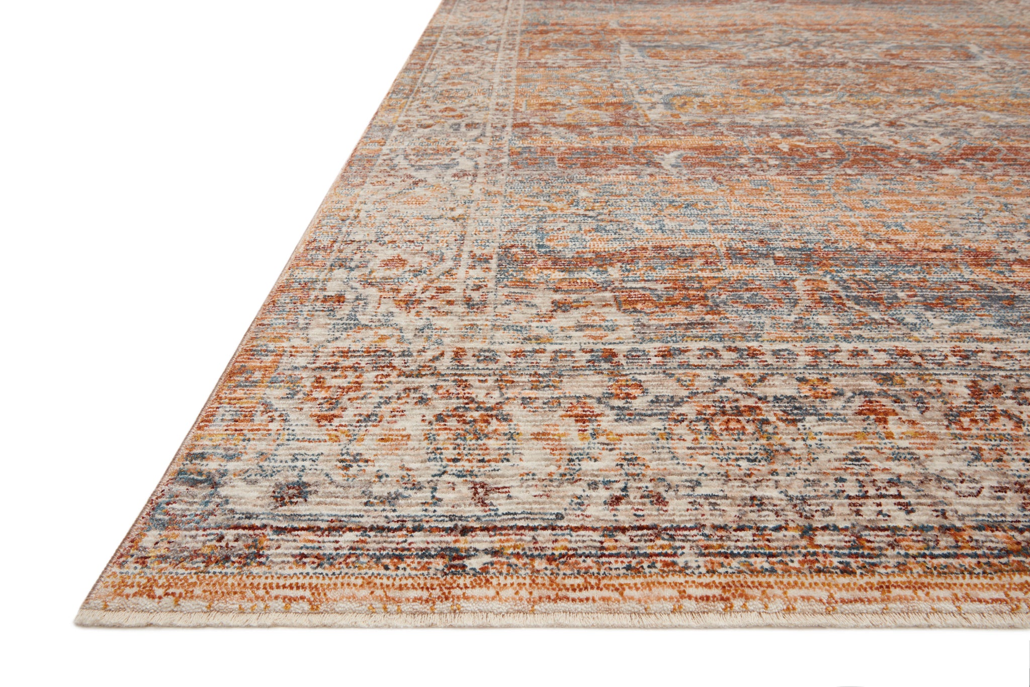 angle view of Lourdes Tangerine / Ocean luxury Rug