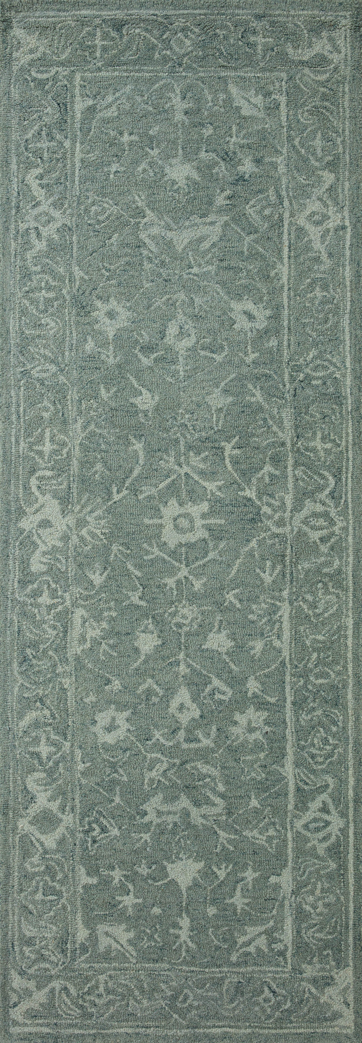 side view of Lyle Teal luxury Rug