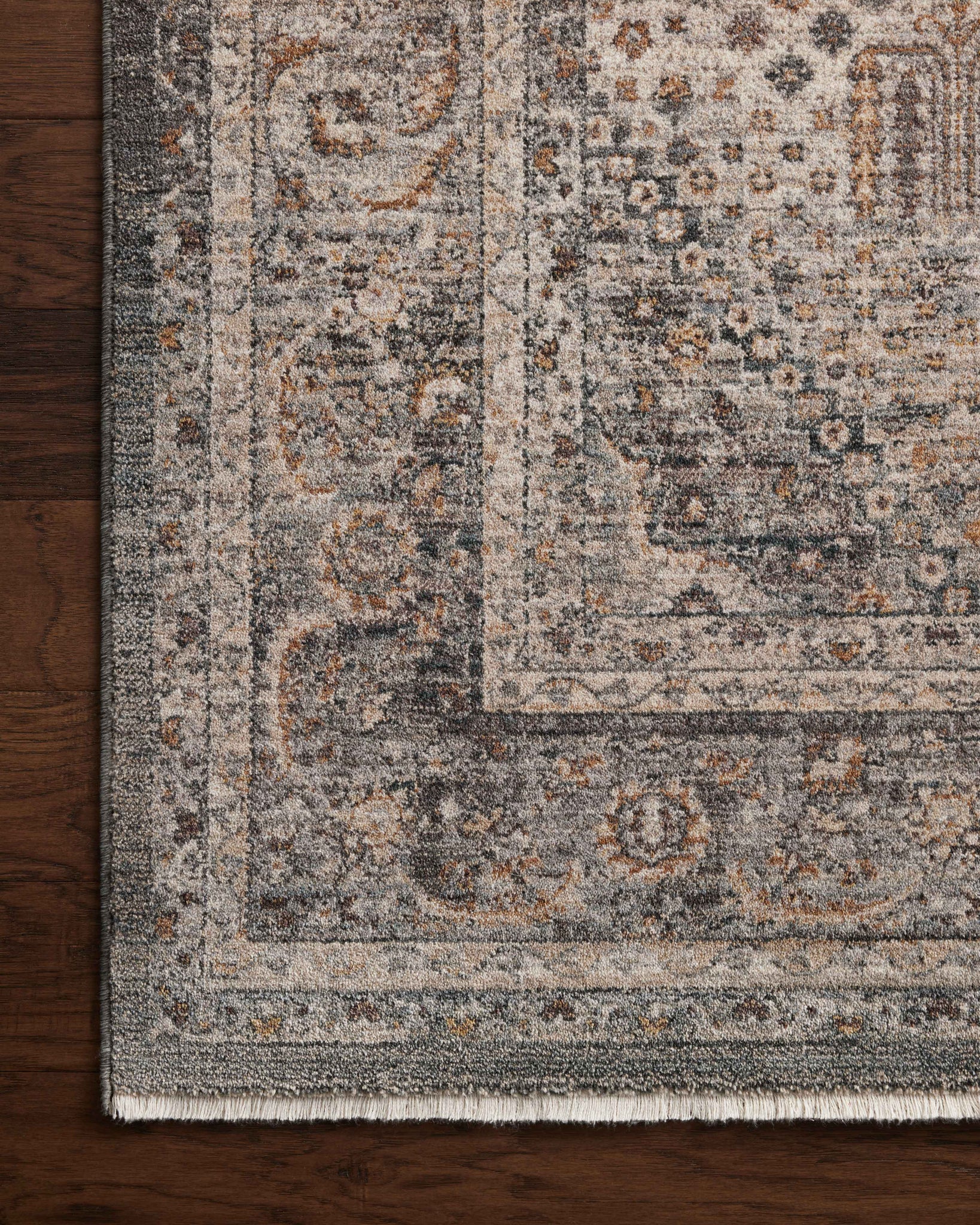 side view of Lyra Denim / Pebble luxury Rug
