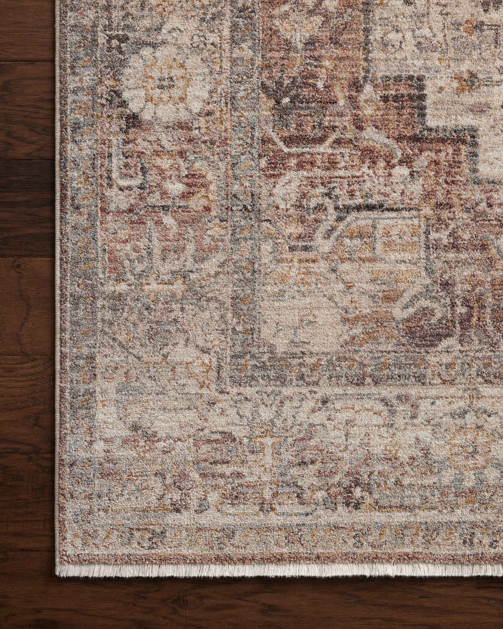side view of Lyra Berry / Stone luxury Rug