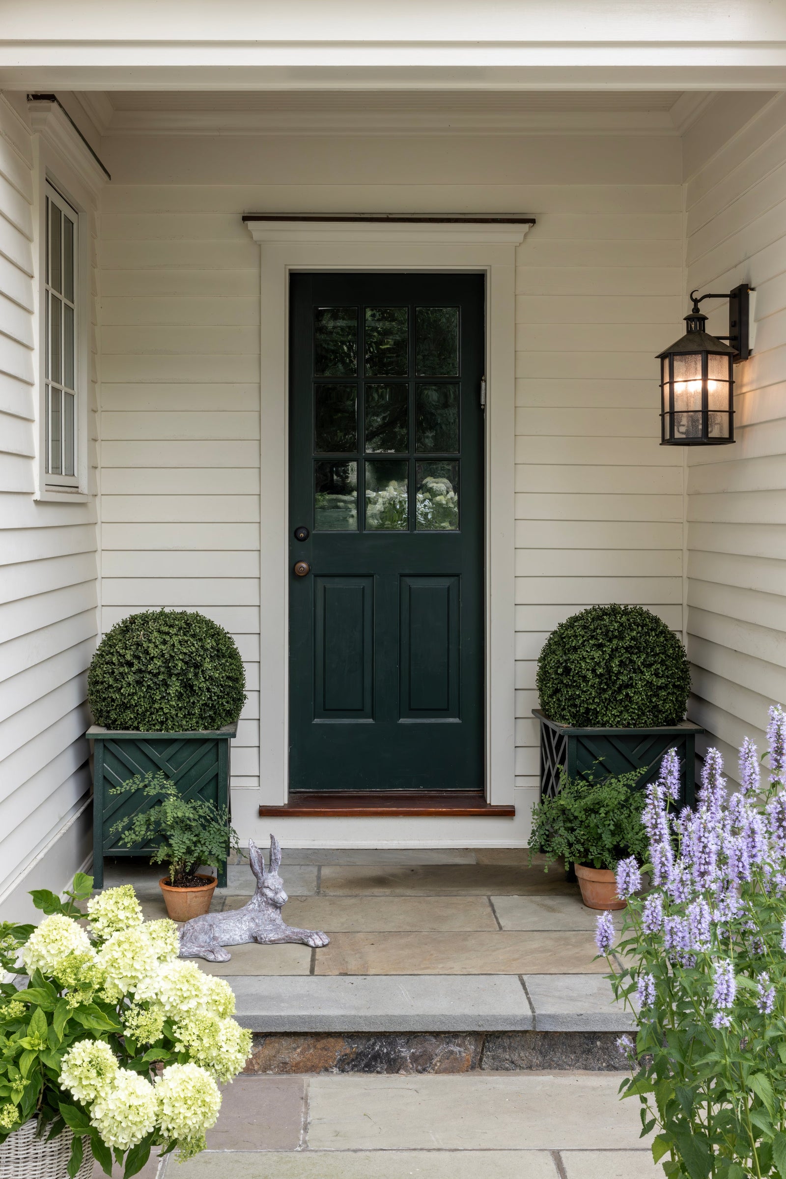 Lake County Exterior Wall Sconce 11.5" — a Troy wall sconce for bathrooms, hallways, and living rooms at Laurie Yapp Home.