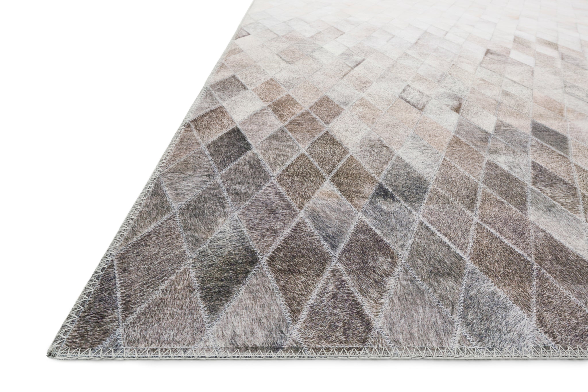 side view of Maddox Sand / Taupe luxury Rug