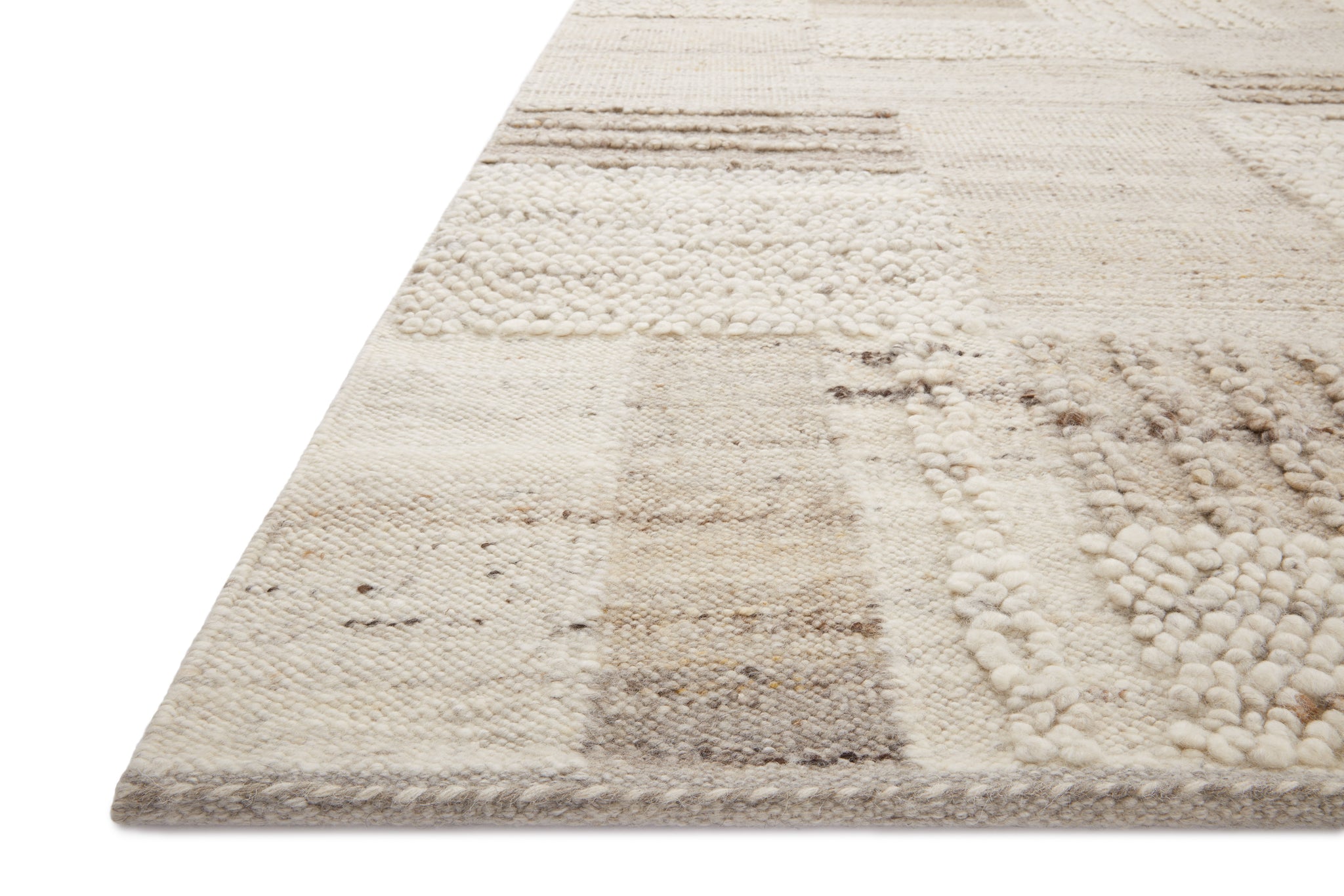 side view of Manfred Natural / Stone luxury Rug