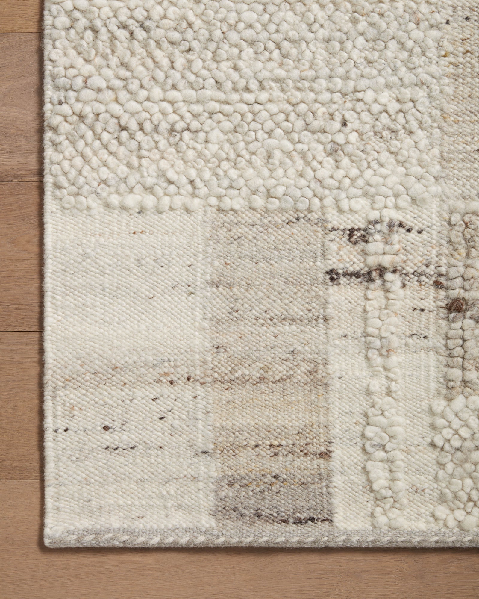 front view of Manfred Natural / Stone luxury Rug