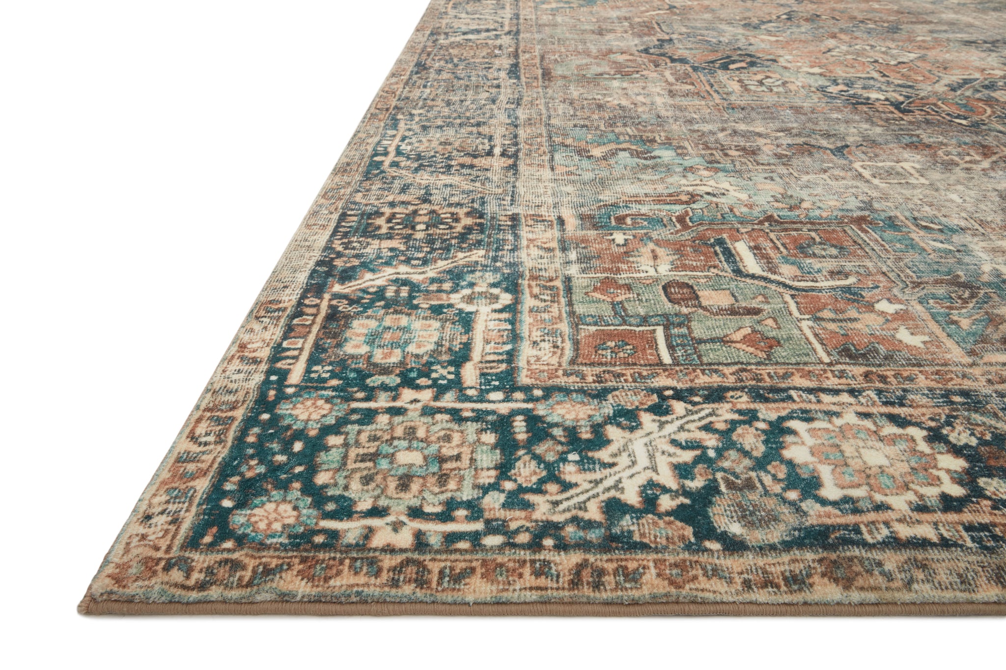 side view of Margot Terracotta / Lagoon luxury Rug