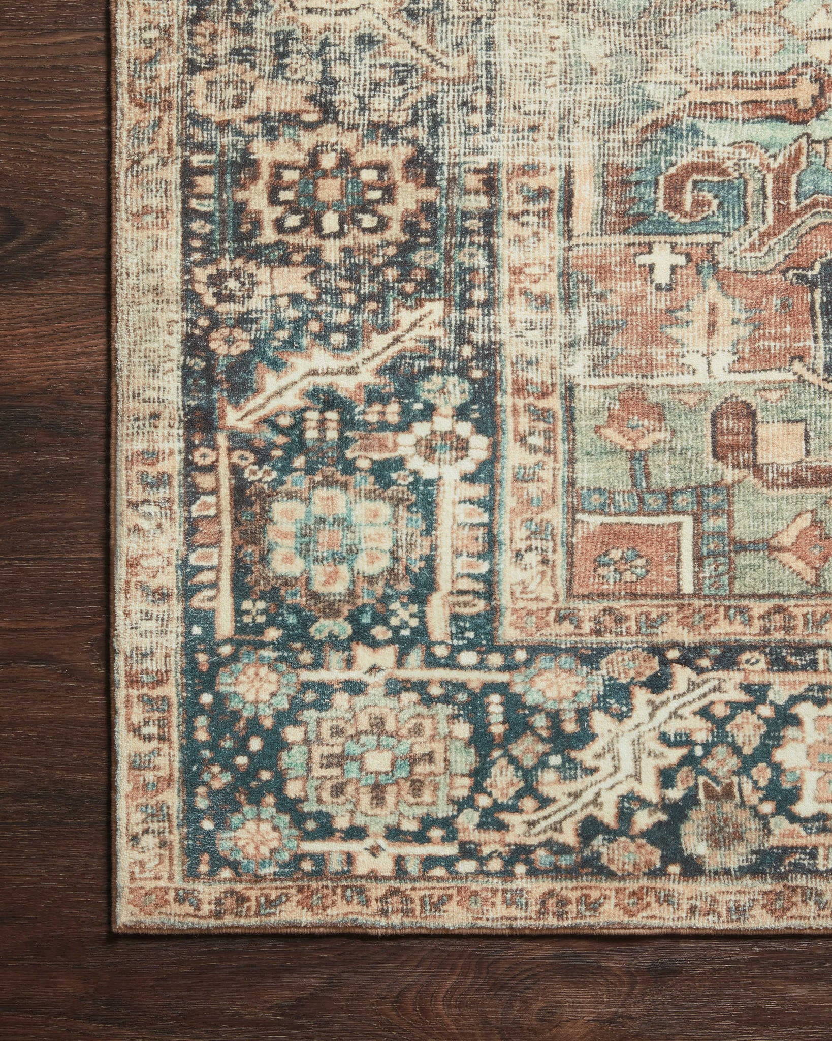 lifestyle view of Margot Terracotta / Lagoon luxury Rug