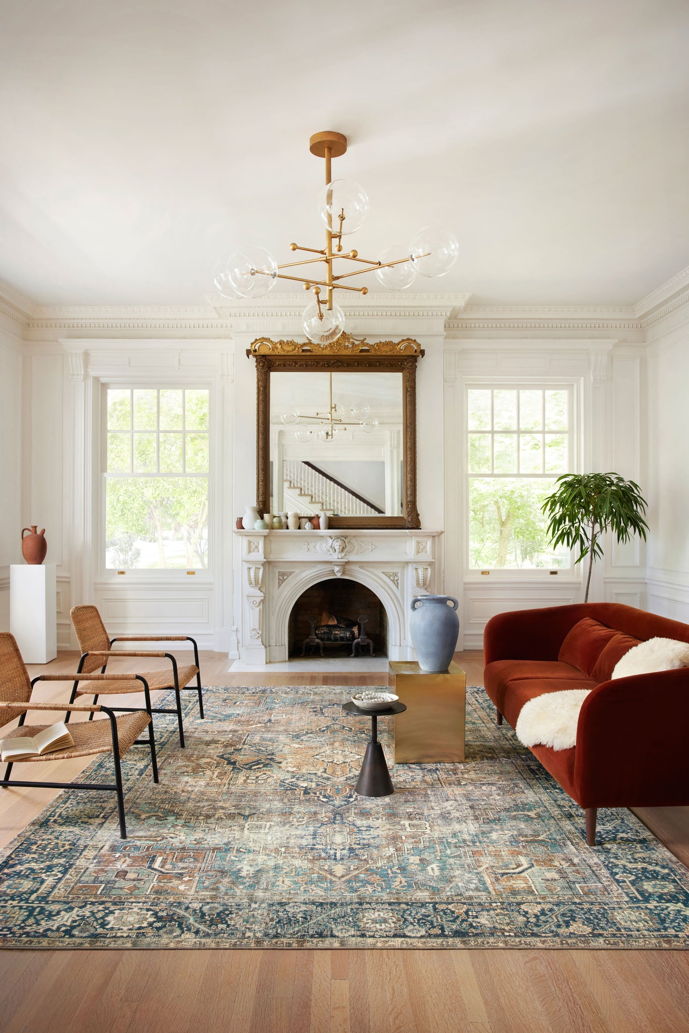 angle view of Margot Terracotta / Lagoon luxury Rug
