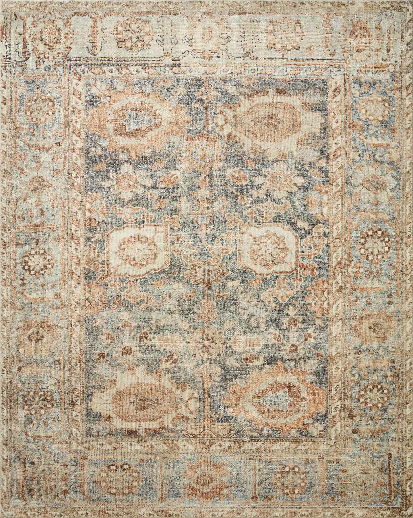 front view of Margot Ocean / Spice luxury Rug