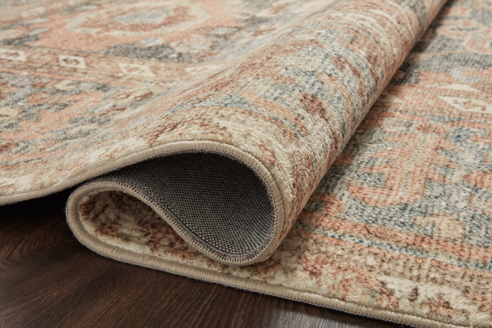 lifestyle view of Margot Ocean / Spice luxury Rug
