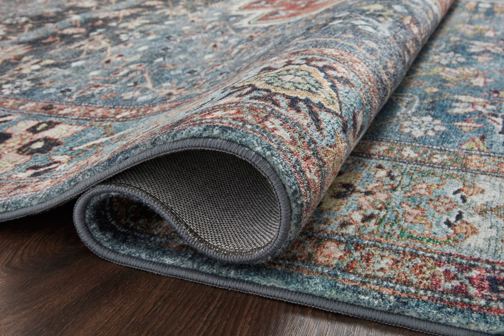 lifestyle view of Margot Ocean / Brick luxury Rug