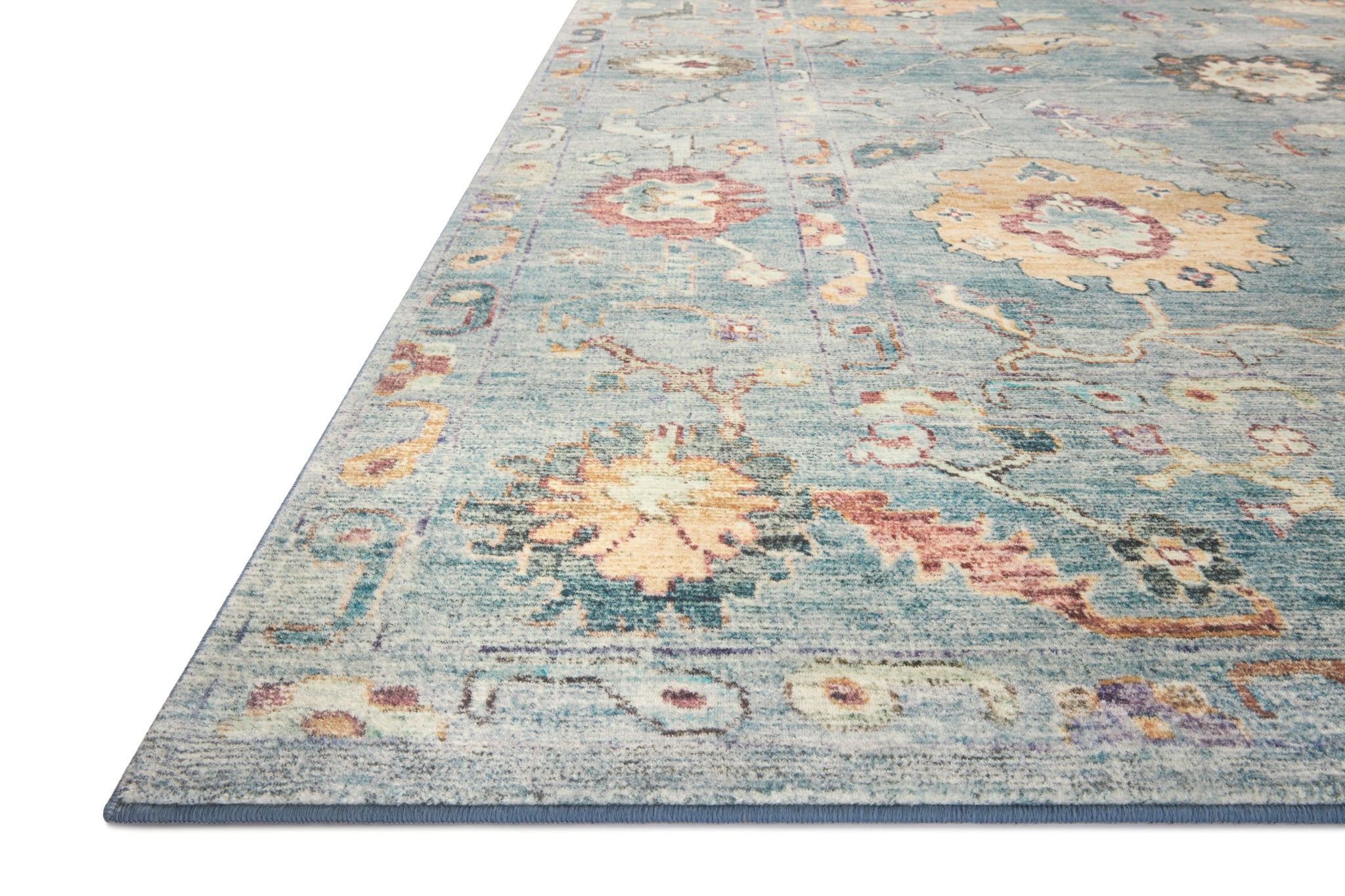side view of Margot Denim / Multi luxury Rug
