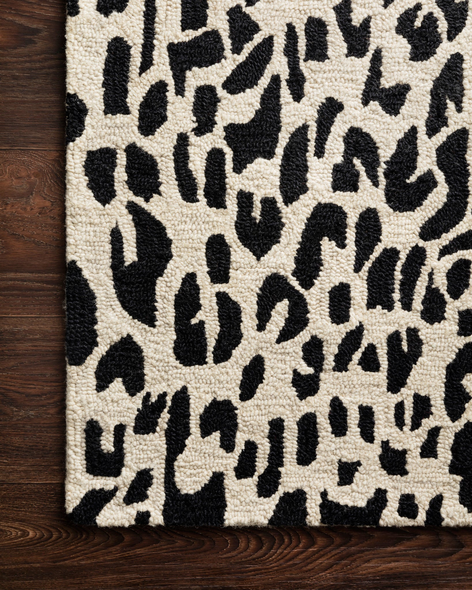angle view of Masai Black / Ivory luxury Rug