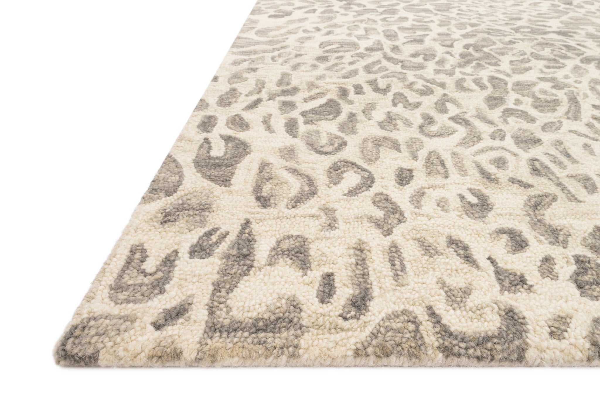 angle view of Masai Grey / Ivory luxury Rug