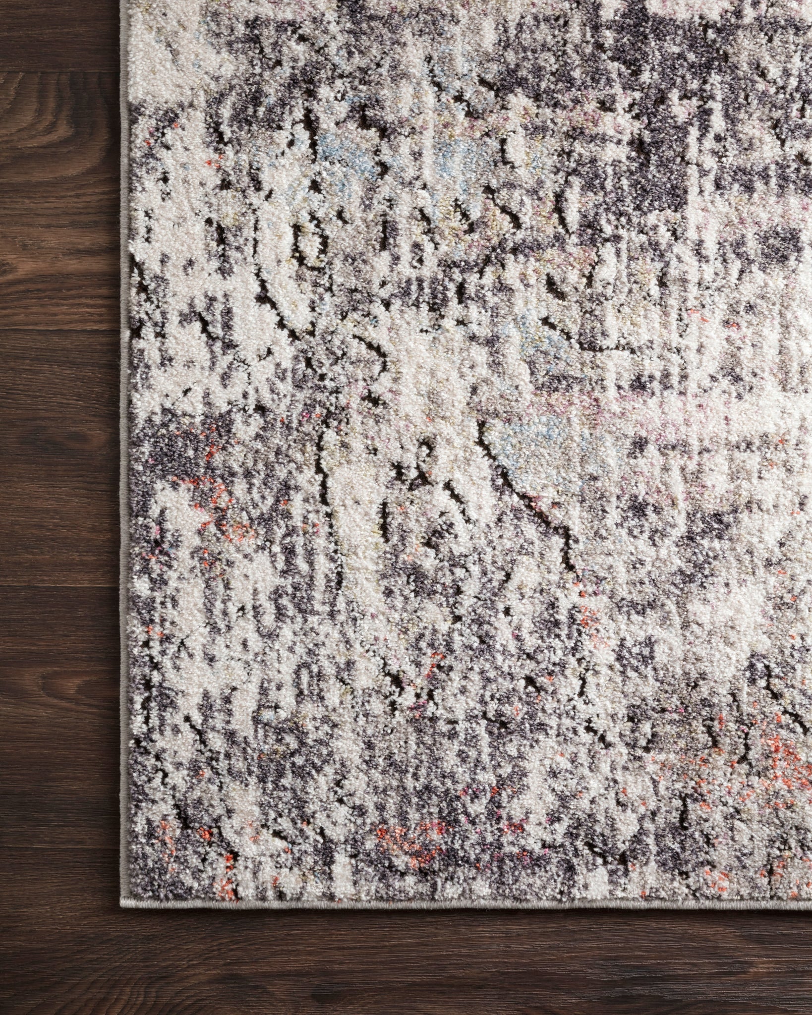 side view of Medusa Ivory / Granite luxury Rug