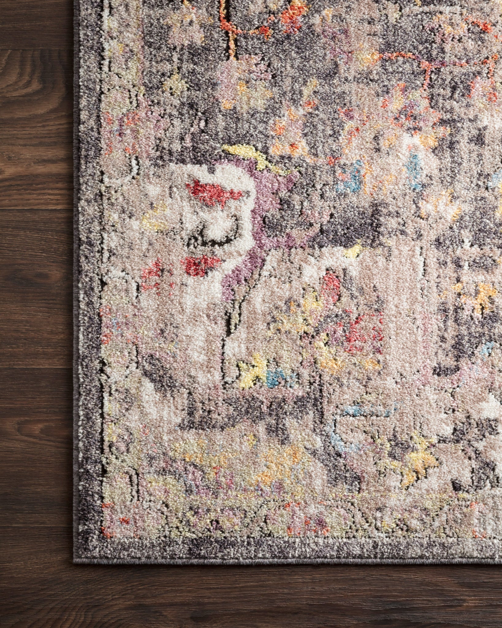 side view of Medusa Charcoal / Fiesta luxury Rug