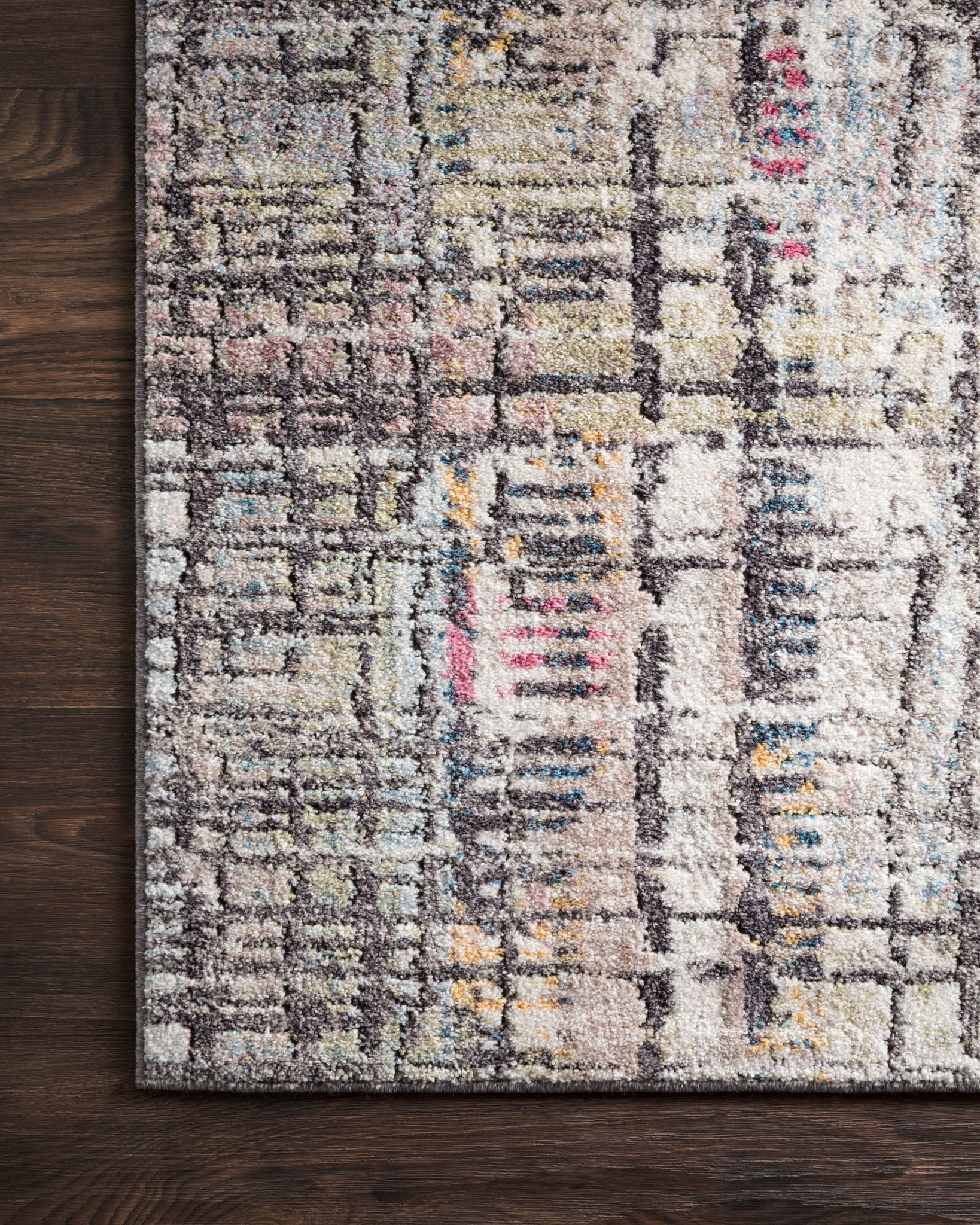 side view of Medusa Charcoal / Multi luxury Rug