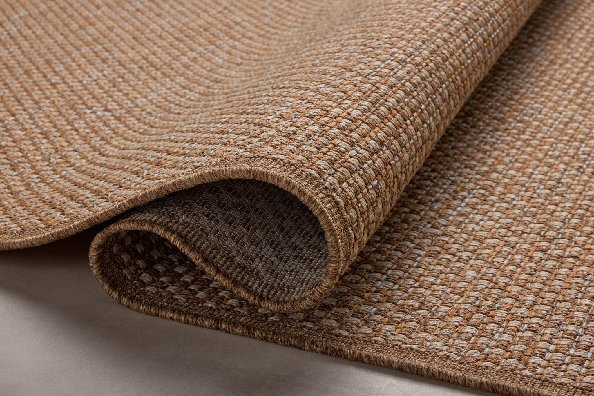 side view of Merrick Natural / Sunrise luxury Rug