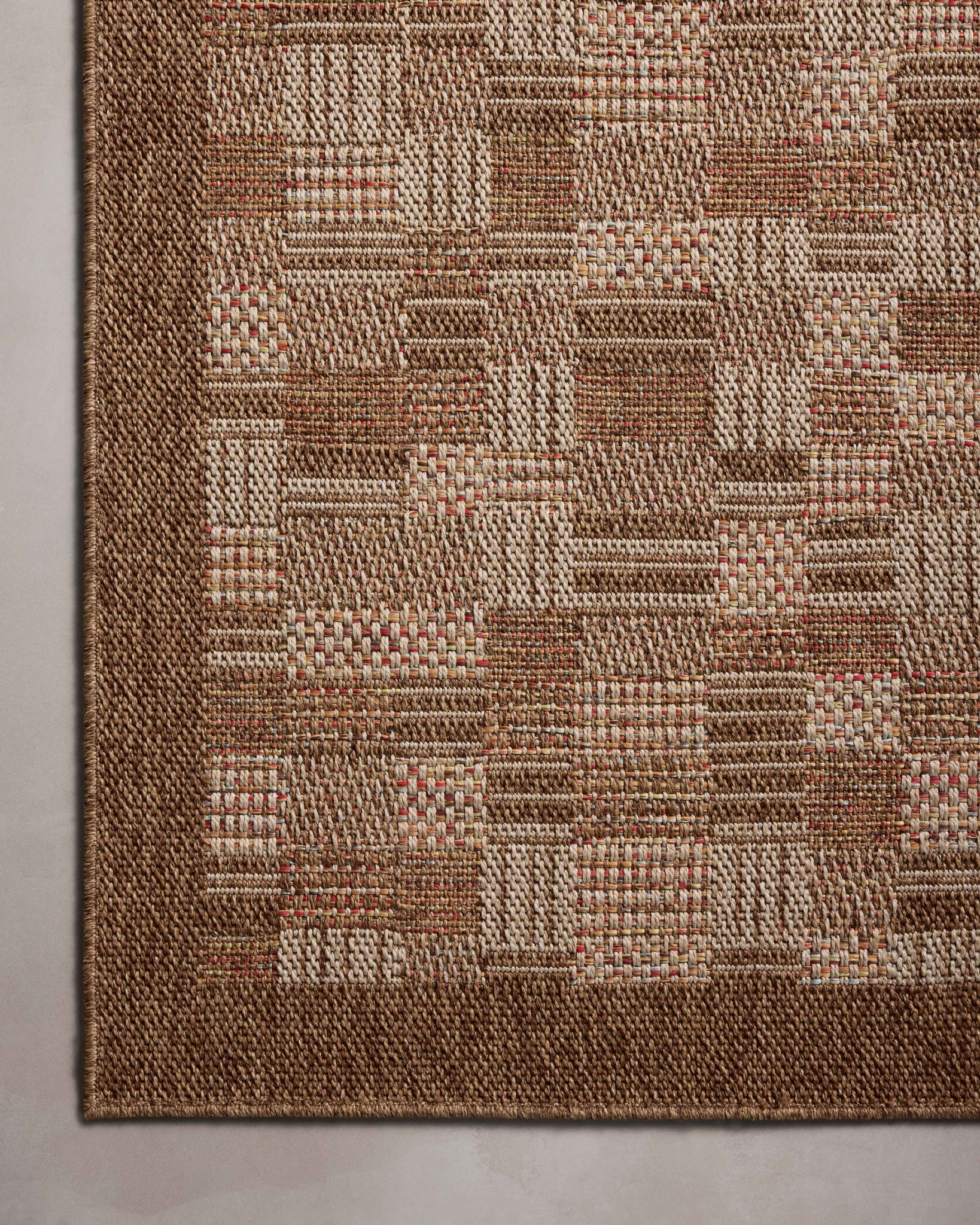 side view of Merrick Chestnut / Fiesta luxury Rug