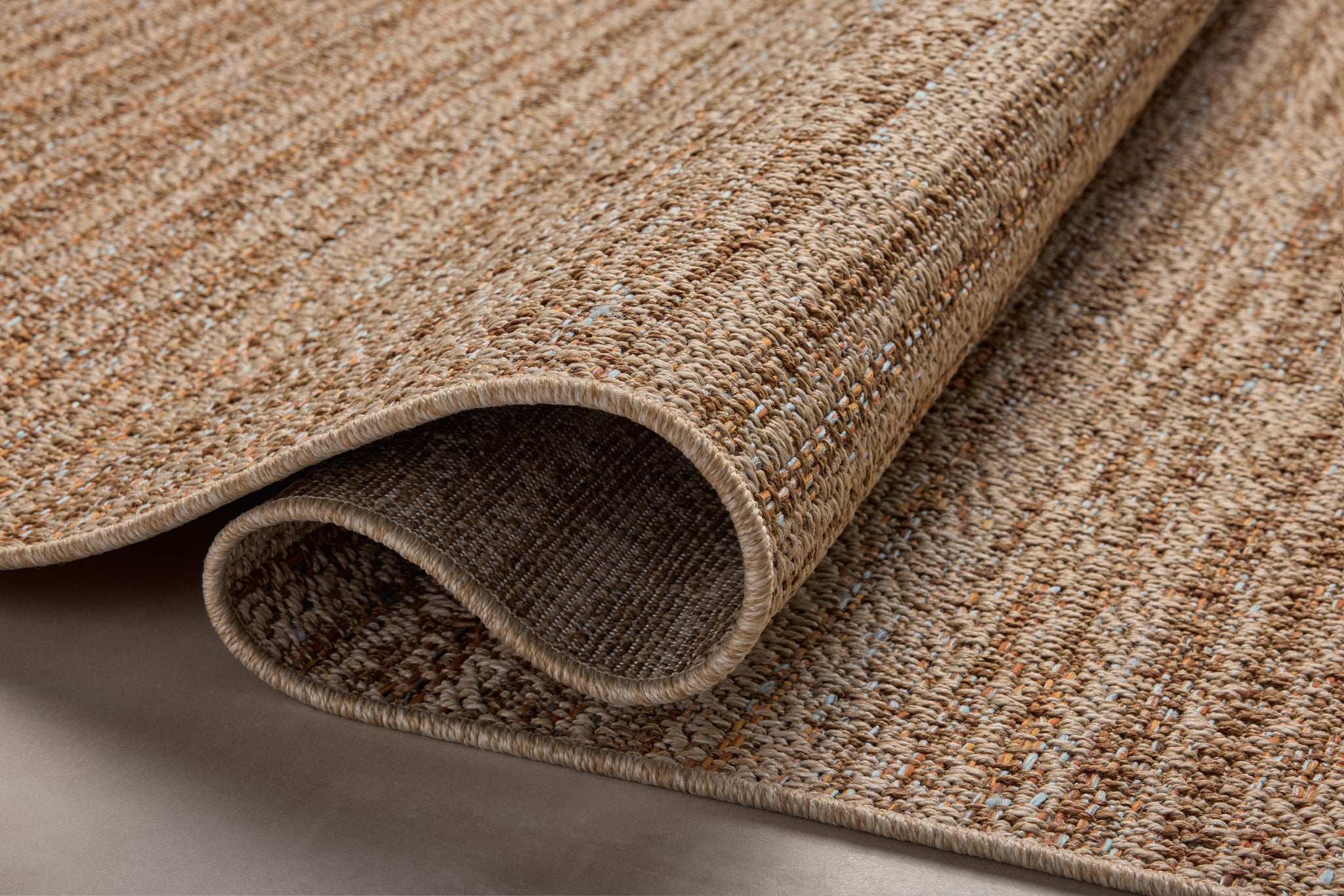 side view of Merrick Oatmeal / Multi luxury Rug