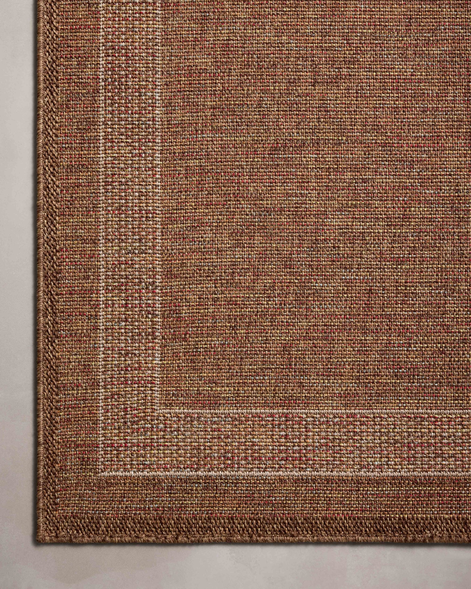 detail view of Merrick Cinnamon / Multi luxury Rug