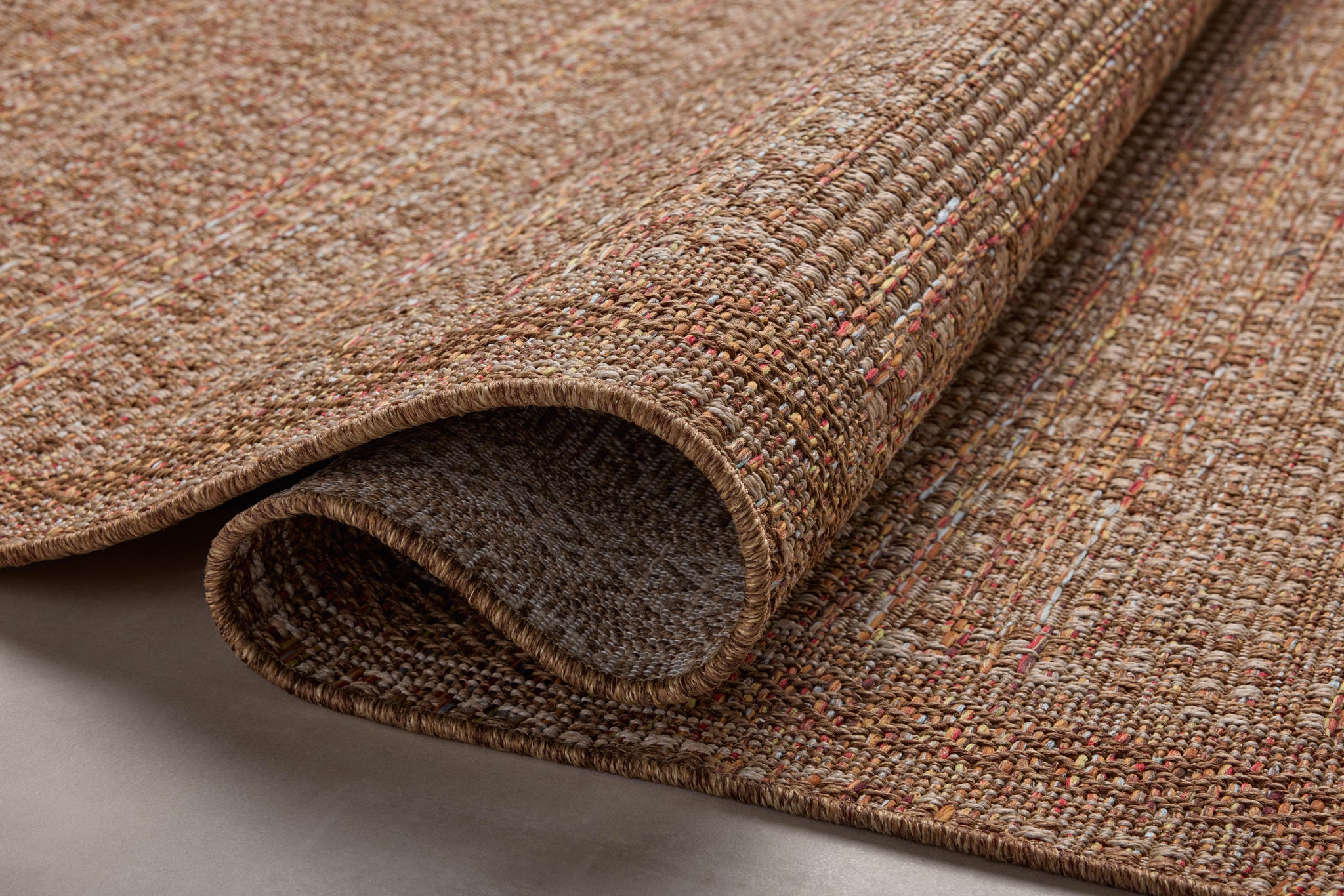 side view of Merrick Natural / Fiesta luxury Rug