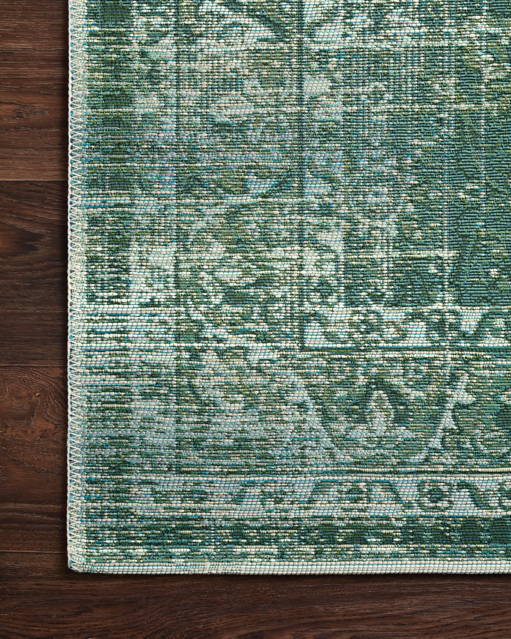 detail view of Mika Green / Mist luxury Rug