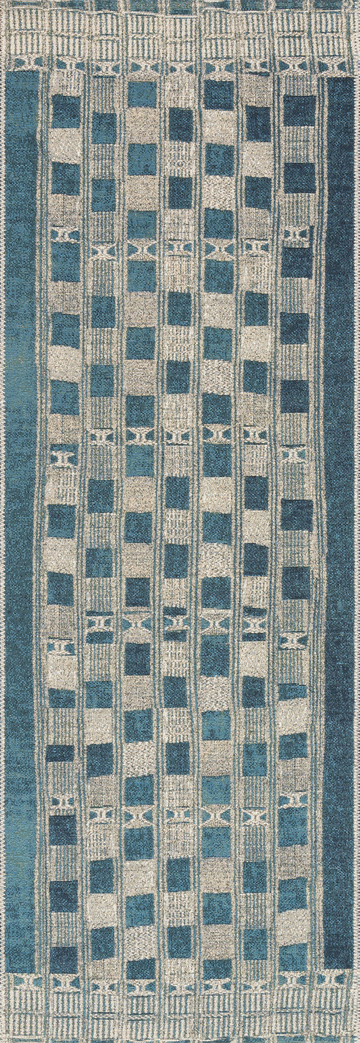side view of Mika Blue / Ivory luxury Rug
