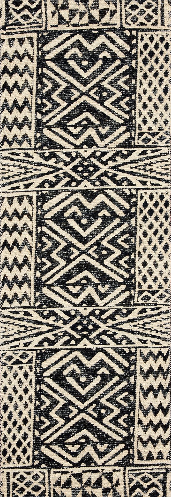 side view of Mika Ivory / Black luxury Rug