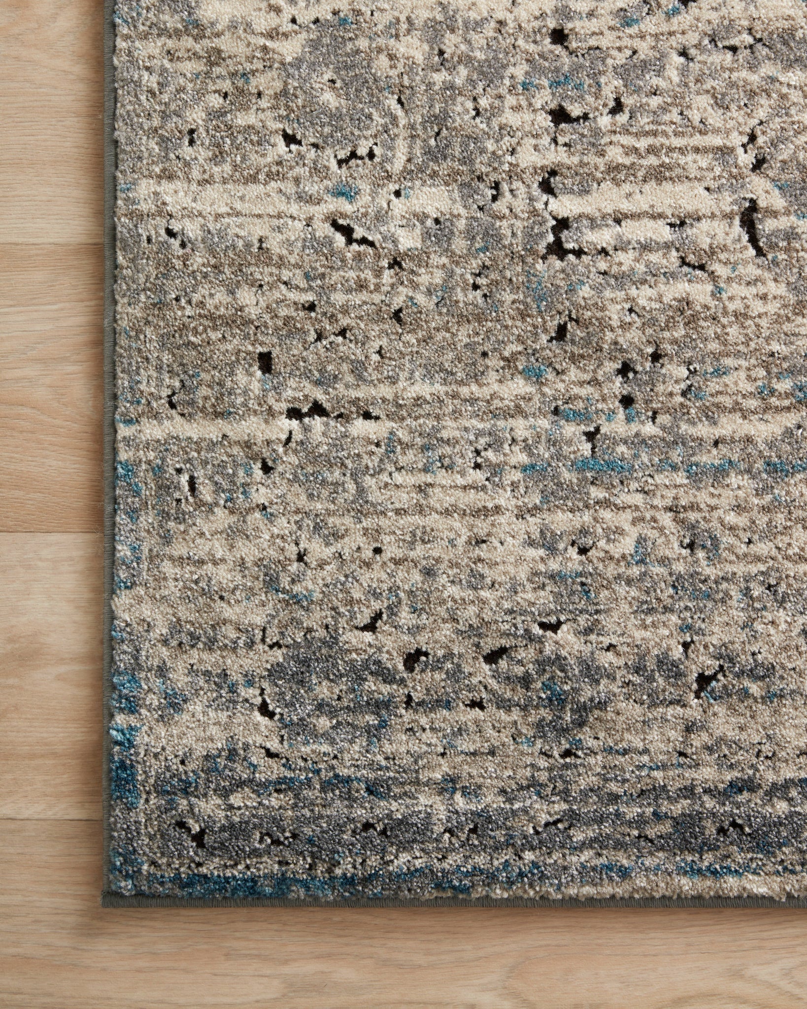 detail view of Millennium Grey / Blue luxury Rug