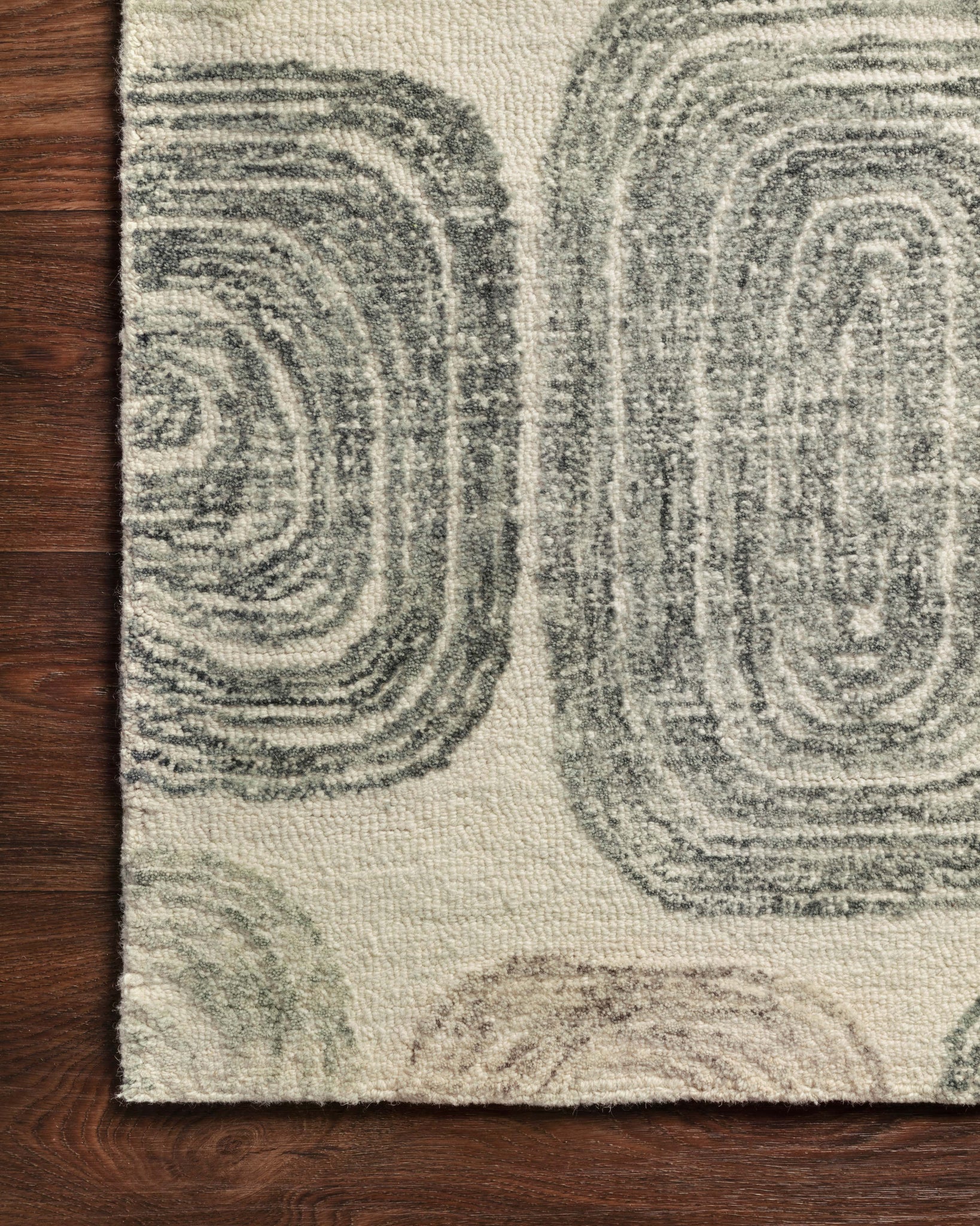 side view of Milo Dk. Grey / Neutral luxury Rug
