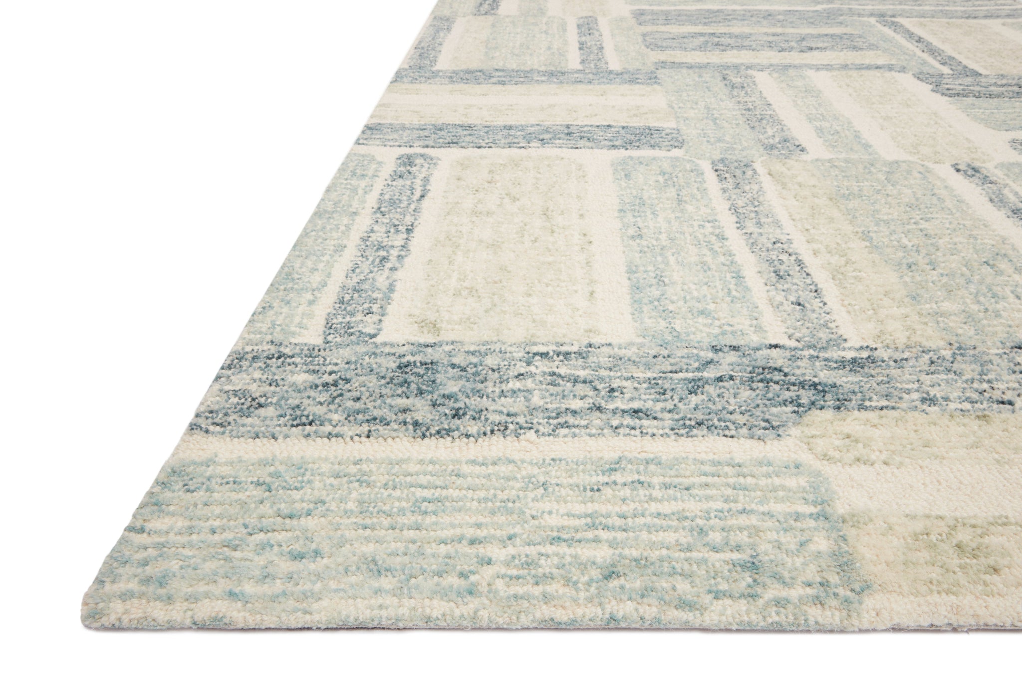angle view of Milo Aqua / Denim luxury Rug