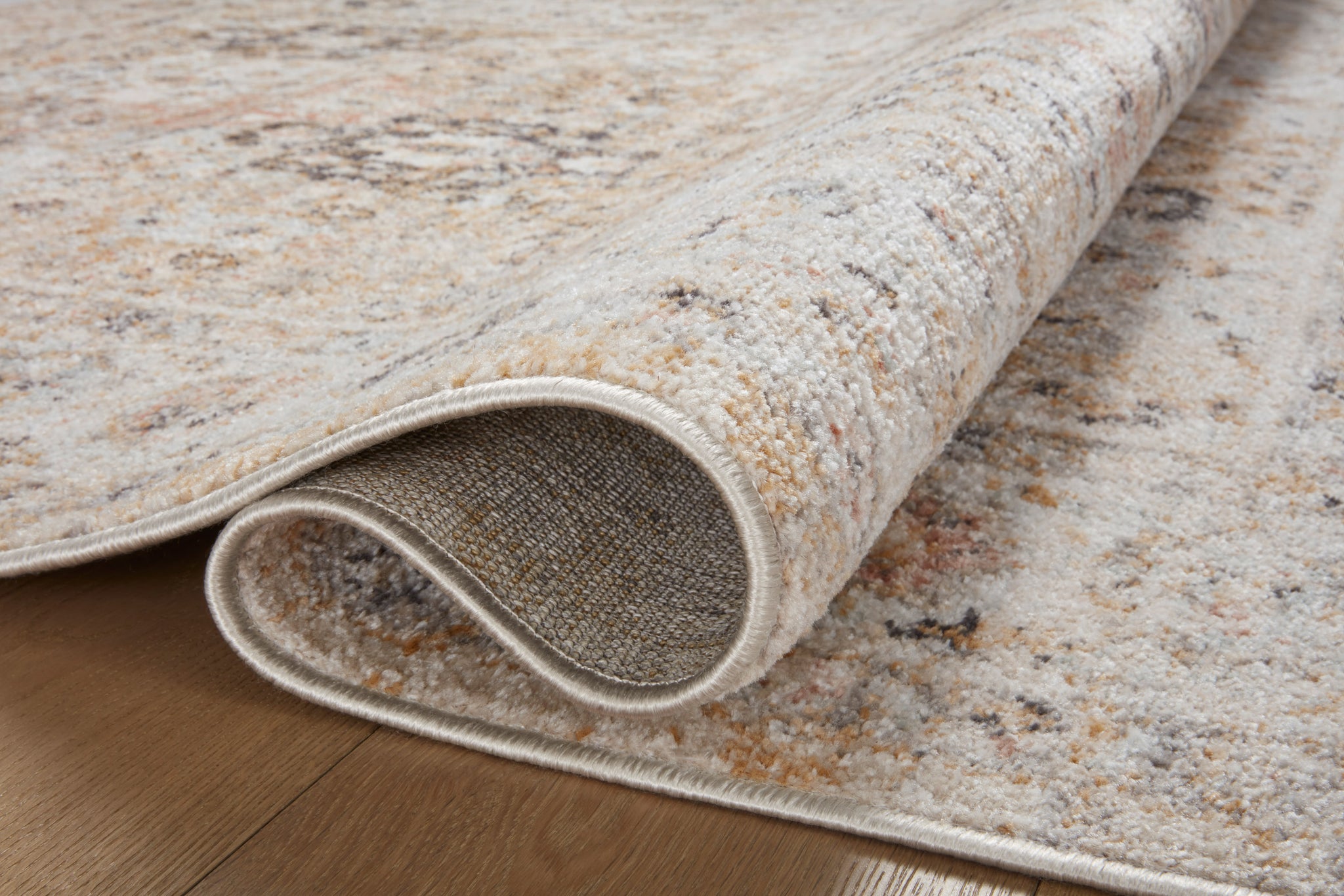 side view of Monroe Beige / Multi luxury Rug