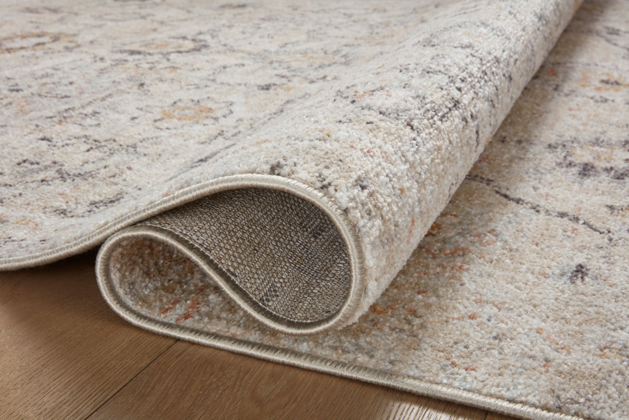 side view of Monroe Natural / Multi luxury Rug
