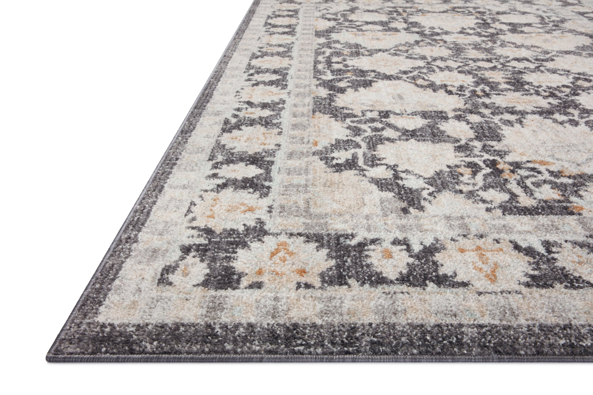 angle view of Monroe Charcoal / Natural luxury Rug