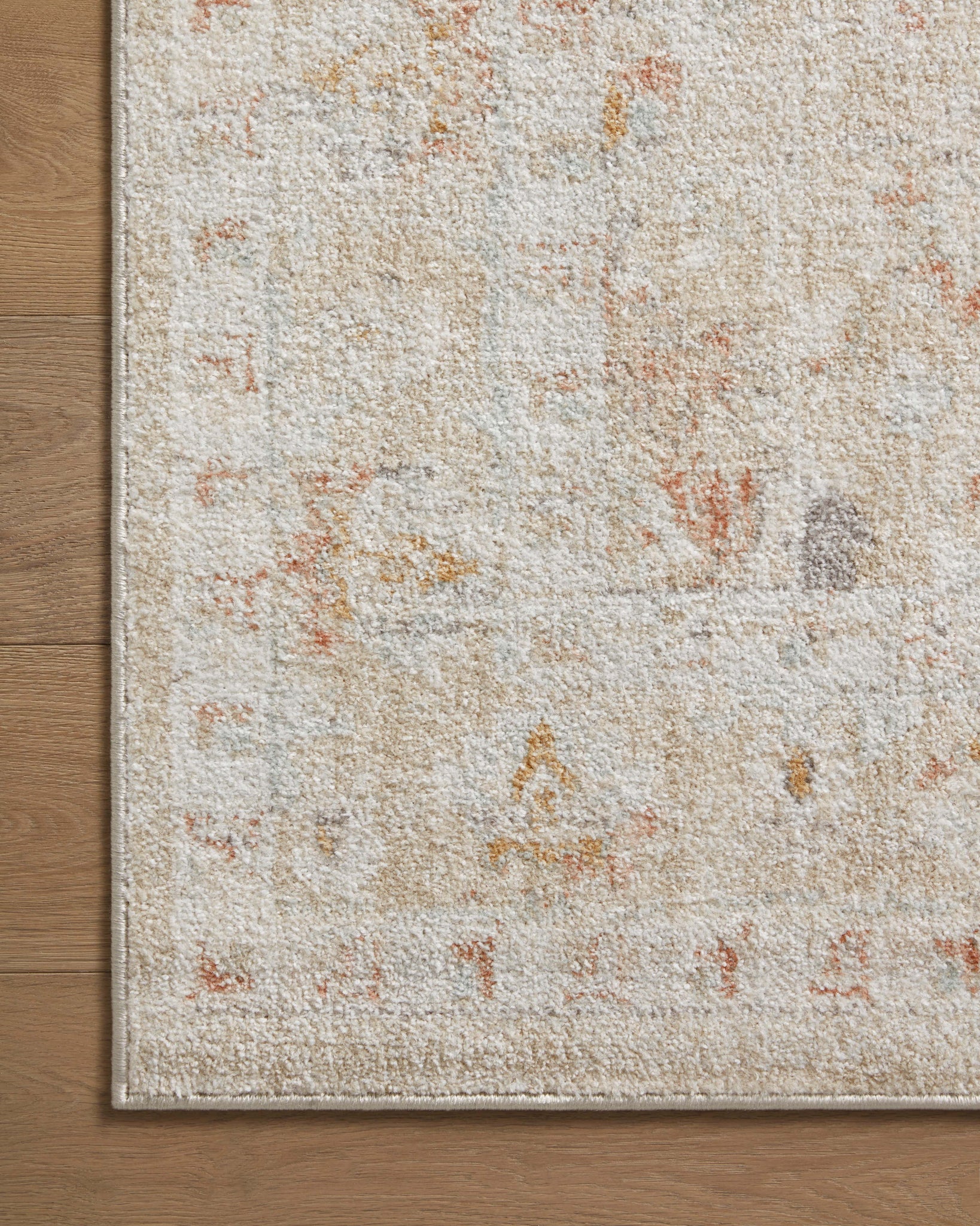 detail view of Monroe Sand / Sunrise luxury Rug