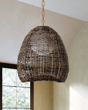 Maester Pendant 24" styled in a welcoming entryway for warm, layered light at Laurie Yapp Home.