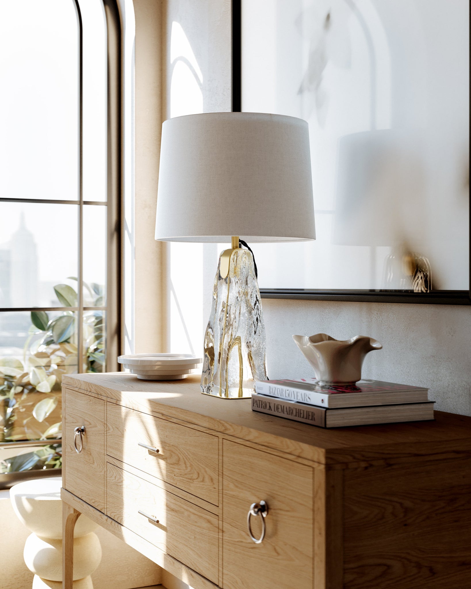 Close-up of the Midura Table Lamp in aged brass showing the base and shade proportions.