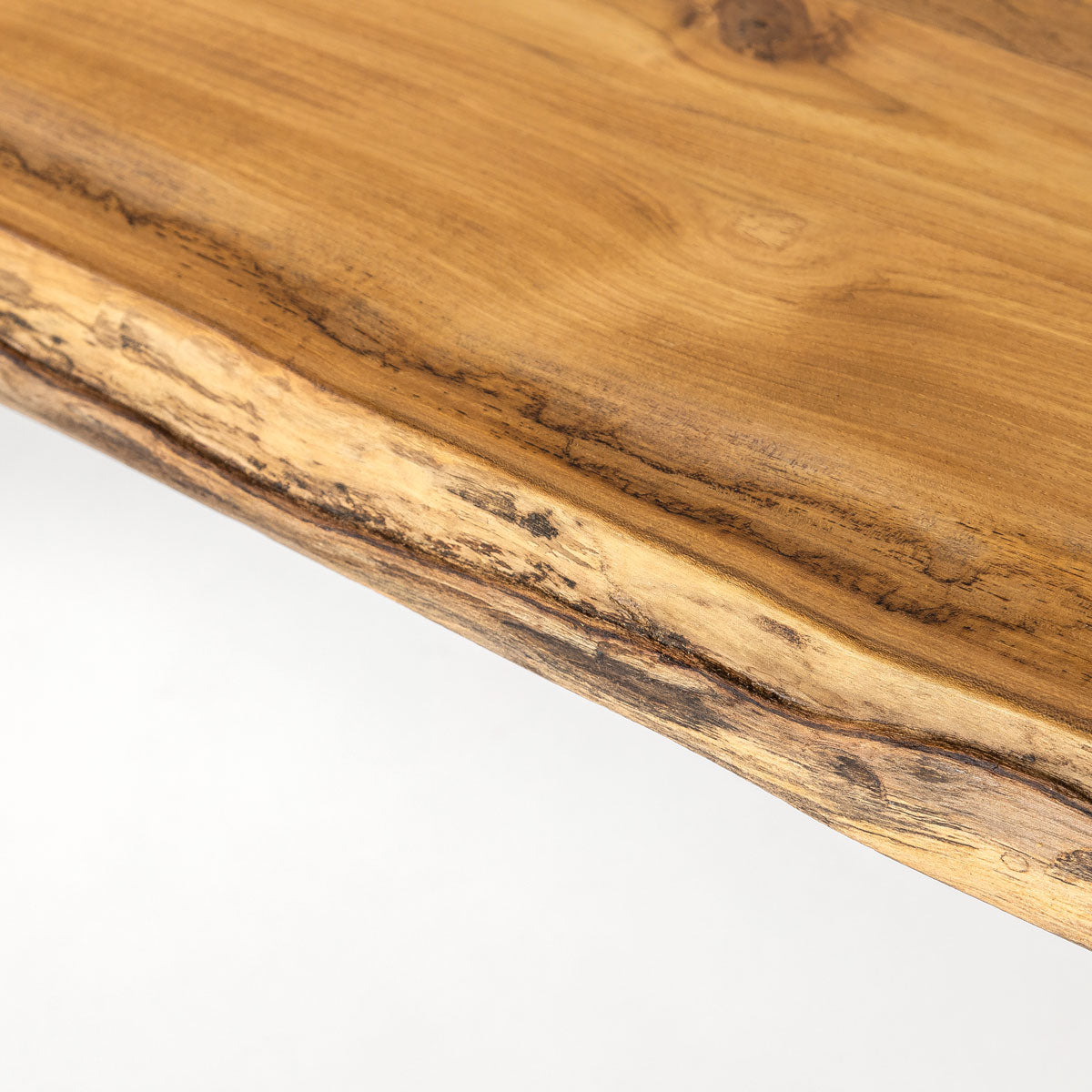 Close-up of a wooden surface with a white background