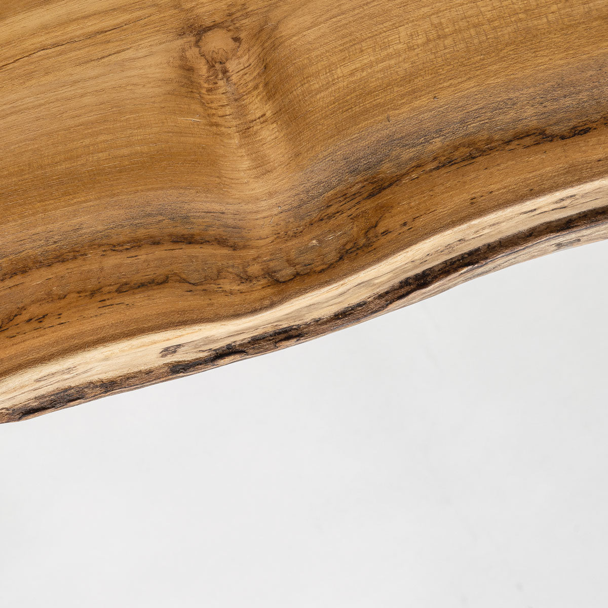 Close-up of a wooden surface with natural grain and texture on a white background
