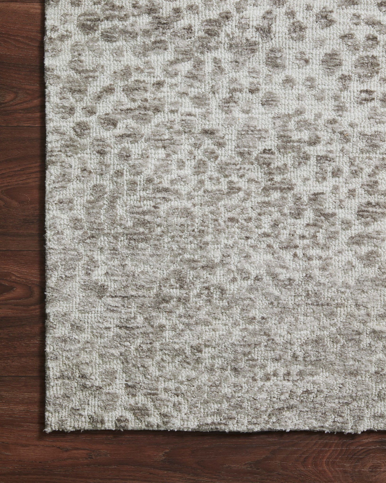 side view of Neda Silver / Ivory luxury Rug