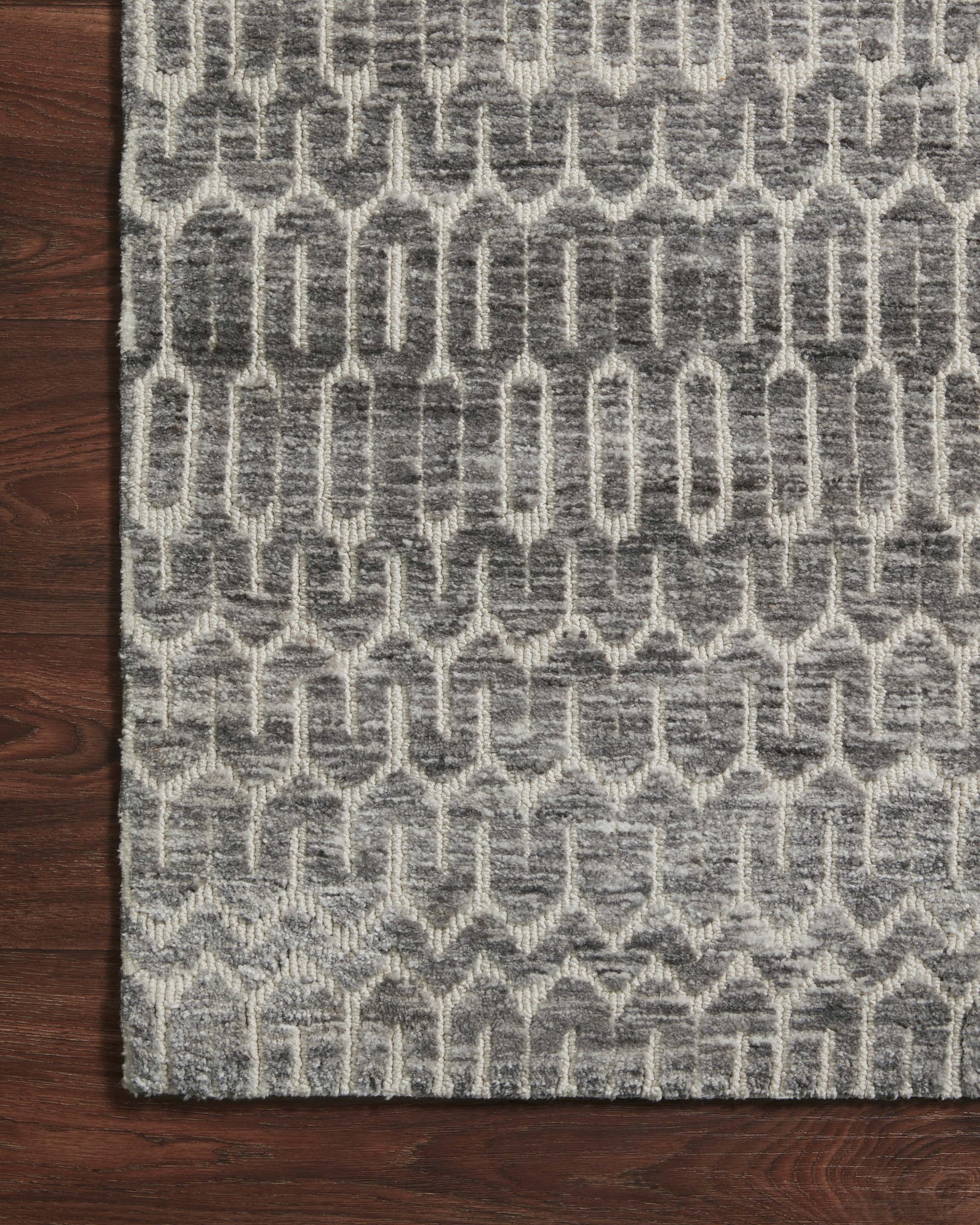 detail view of Neda Ivory / Charcoal luxury Rug