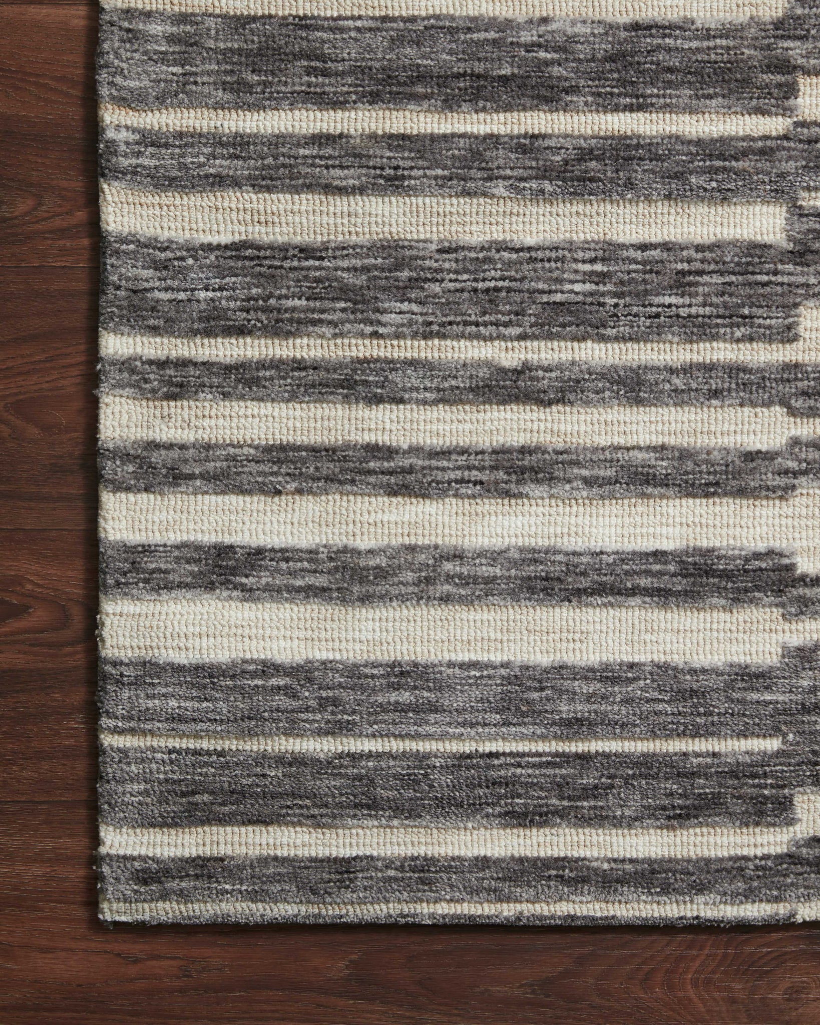 side view of Neda Natural / Slate luxury Rug