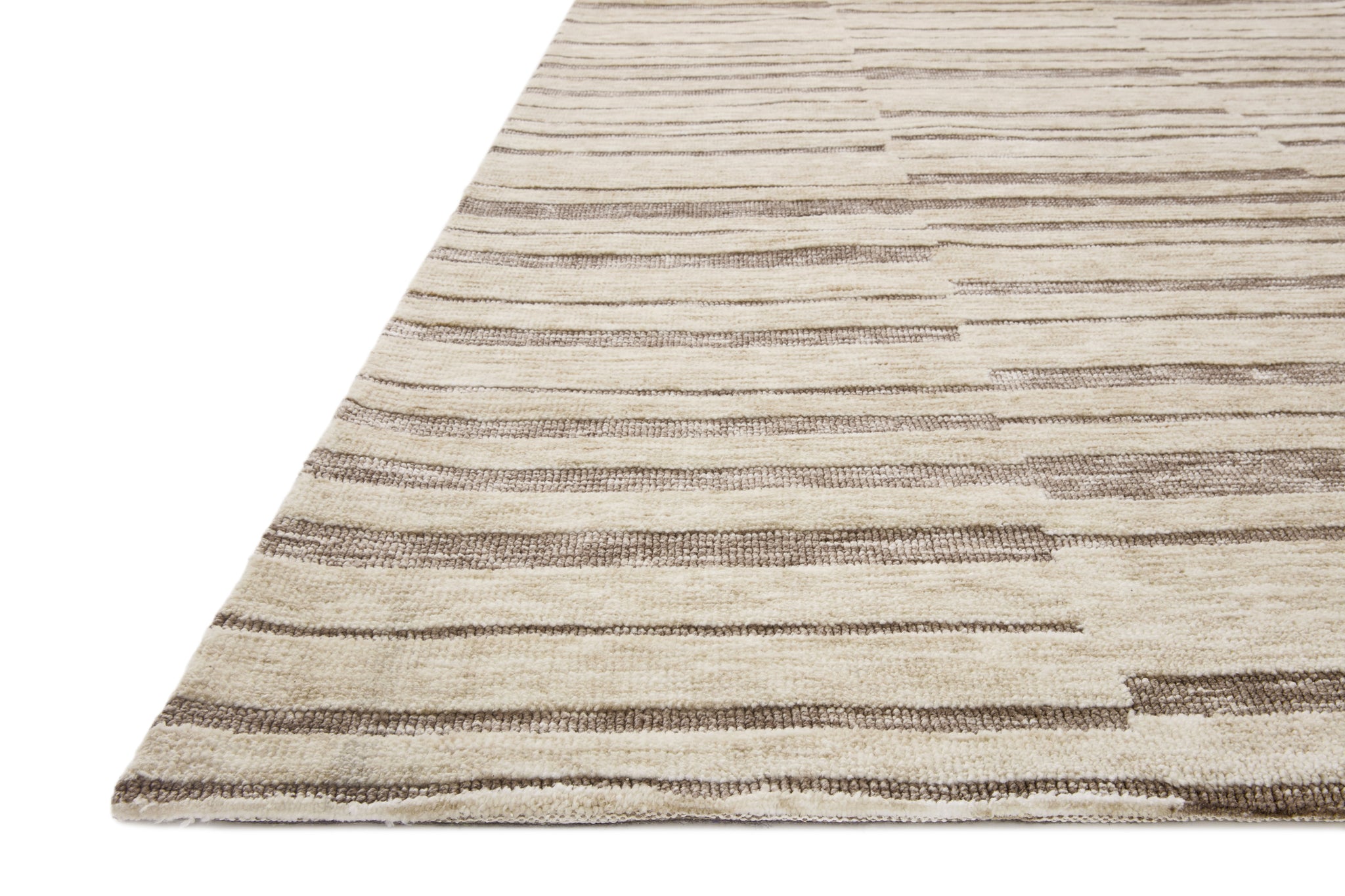 side view of Neda Natural / Taupe luxury Rug
