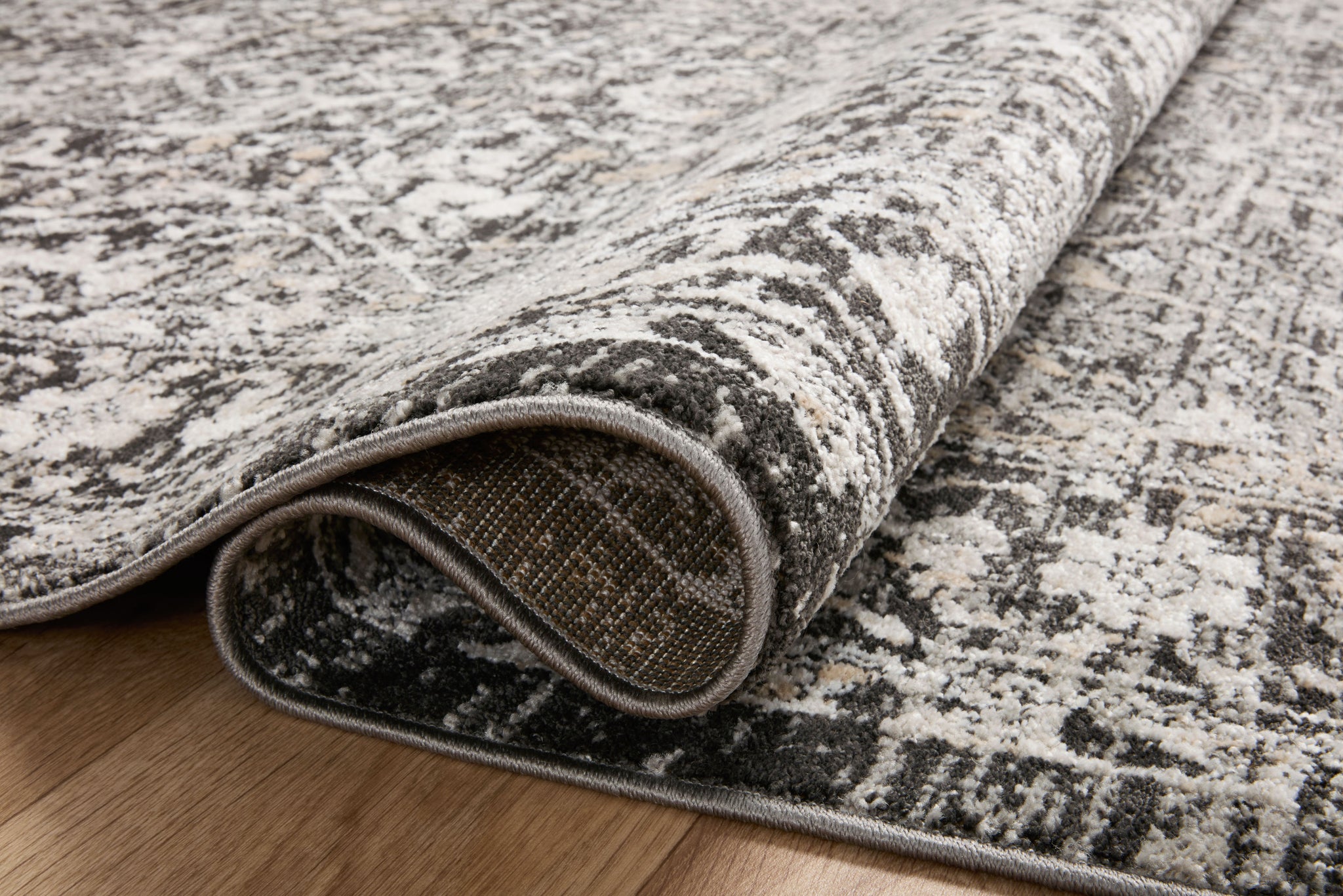 detail view of Odette Charcoal / Silver luxury Rug