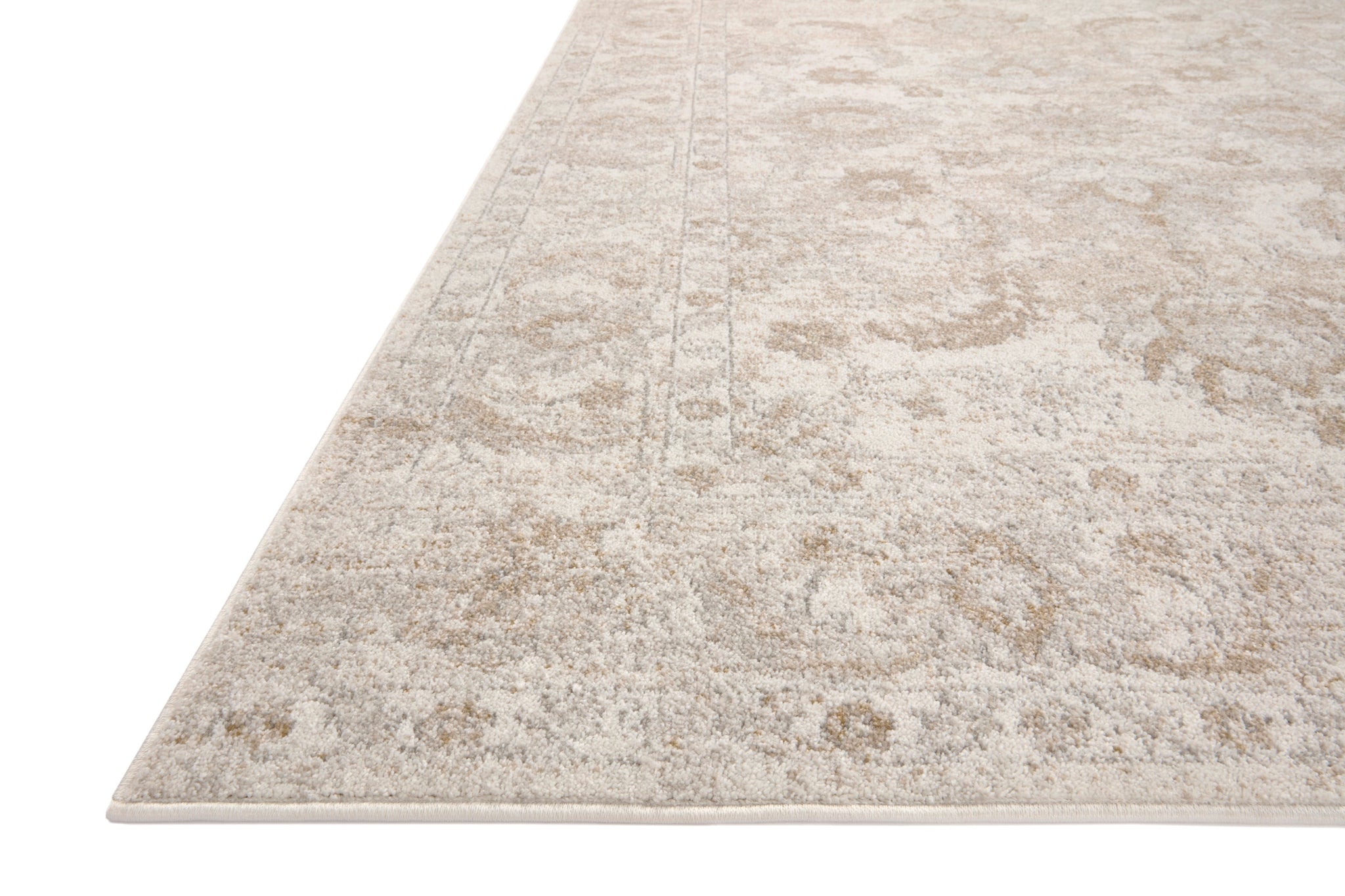 side view of Odette Ivory / Beige luxury Rug