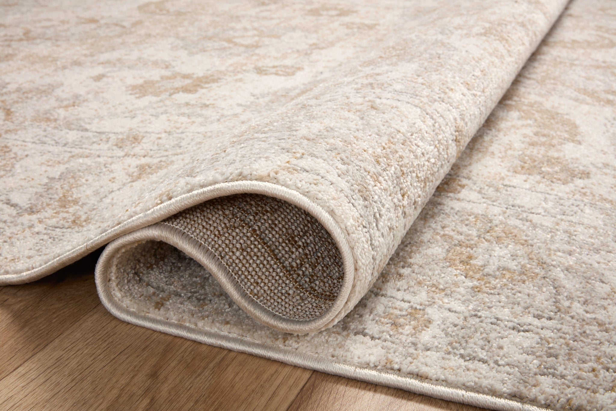 detail view of Odette Ivory / Beige luxury Rug